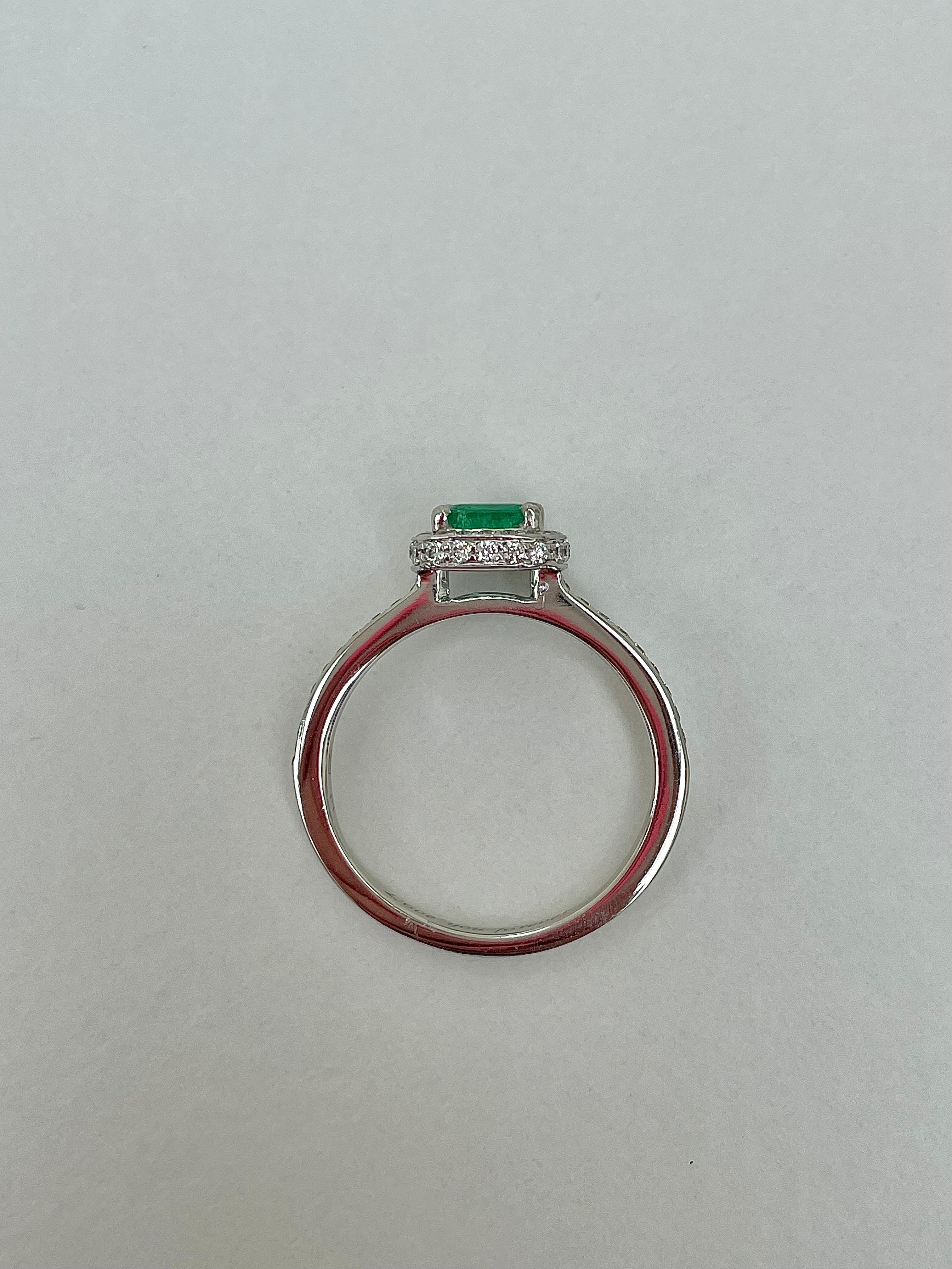 Vintage Platinum Emerald and Diamond Halo Ring  In Good Condition For Sale In Chipping Campden, GB