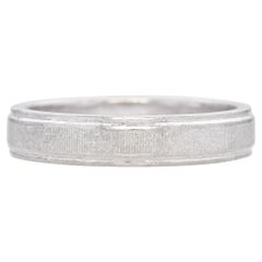 Alianza de boda vintage grabada en platino