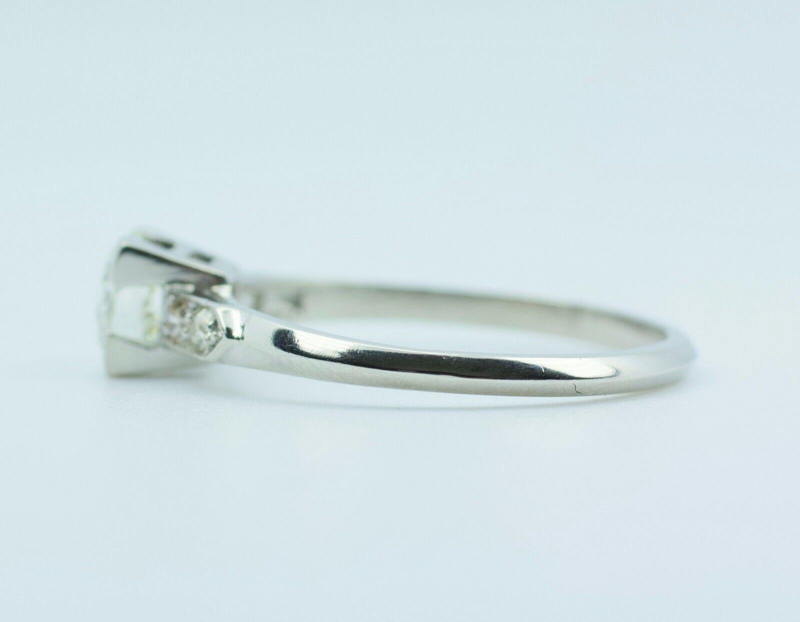 Art Deco Vintage Platinum European Cut Center with Single Cut Diamonds Ring