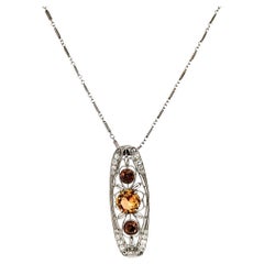 Vintage Platinum Filigree Pendant with Precious Topaz and Brown Diamonds