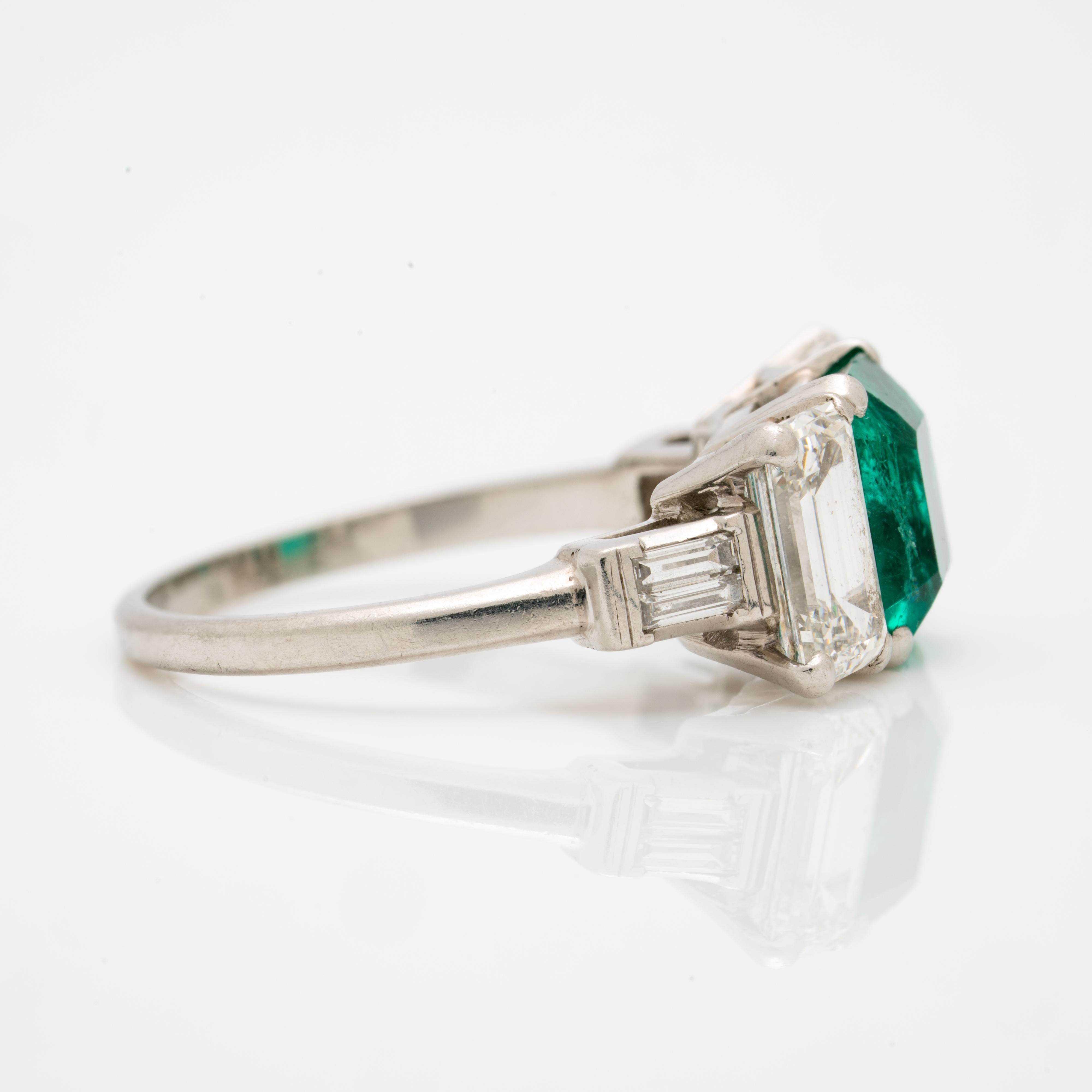 Women's or Men's Platinum GIA 1.20 Carat Colombian Emerald and 1.10 Carat Emerald Cut Diamonds