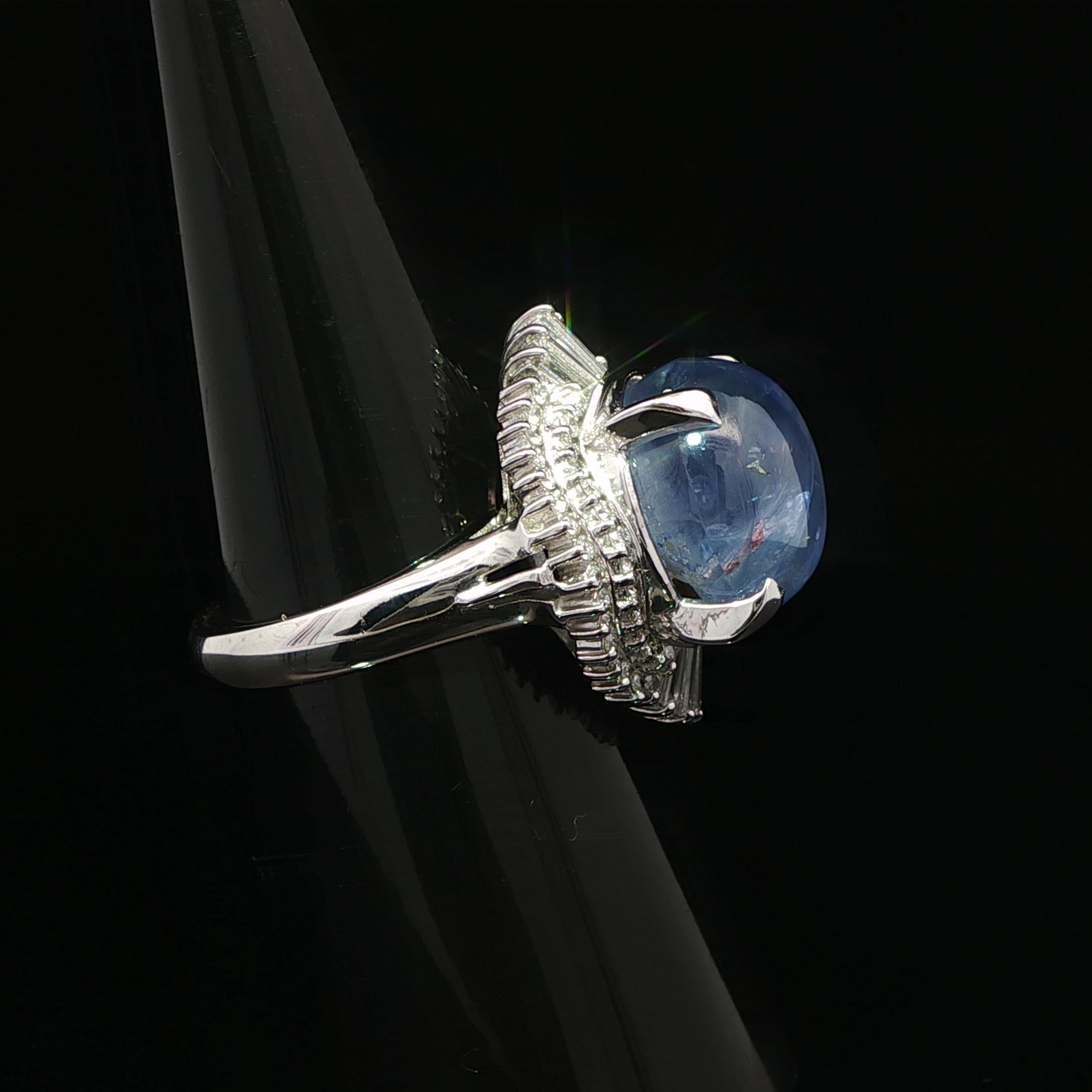 --Stone(s):--
(1) Natural Genuine Star Sapphire - Oval Double Cabochon Cut - Prong Set - Violetish Blue Color - No Heat - 100% Natural -13.29ct (exact.)
** See Certification Details Below for Complete Info **
Numerous Natural Genuine Diamonds -
