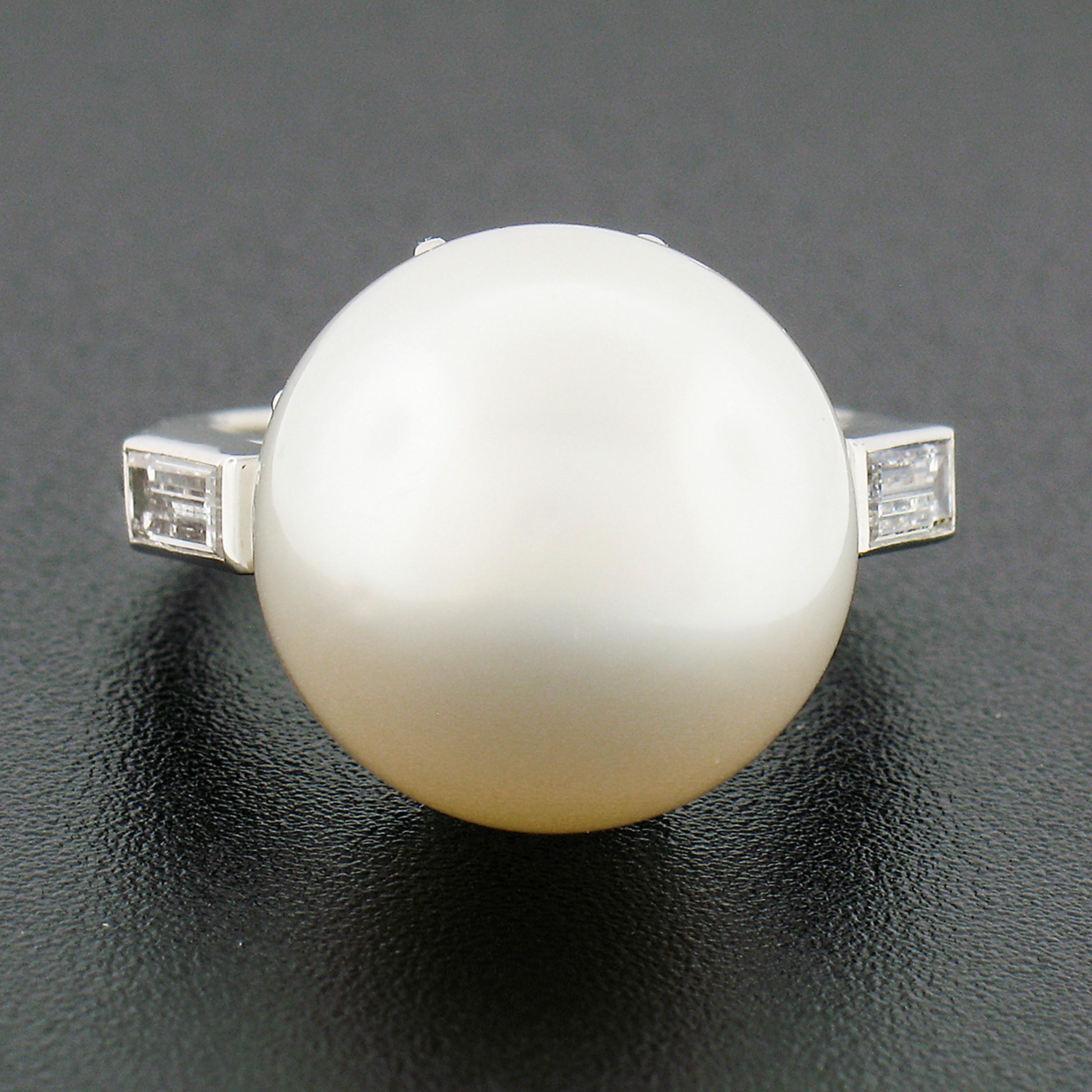 This bold, vintage statement ring is crafted from solid platinum and features a genuine cultured saltwater pearl that has been certified by GIA. The pearl displays very desirable and pure white color throughout with no indications of treatment and