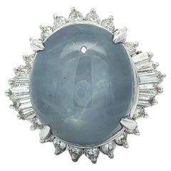 Anillo con halo de diamantes y zafiro estrella azul cabujón vintage de platino GIA 17,45 ctw
