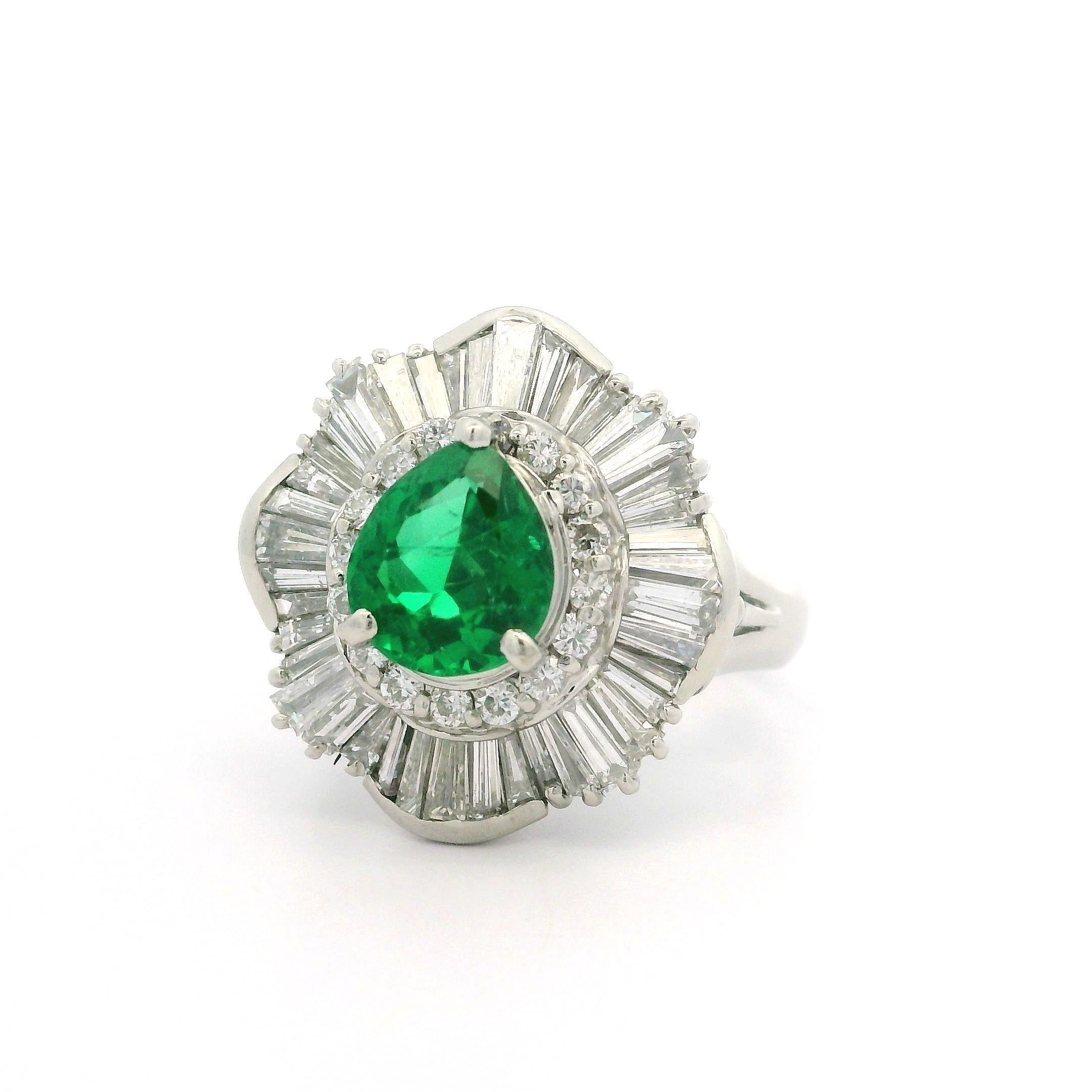 --Stone(s):--
(1) Natural Genuine Emerald - Pear Cut - Prong Set - Vivid Green Color - Clarity Enhanced F2 - 1.17ct (exact)** See Certification Details Below for Complete Info **
Numerous Natural Genuine Diamonds - Baguette & Round Brilliant Cut -