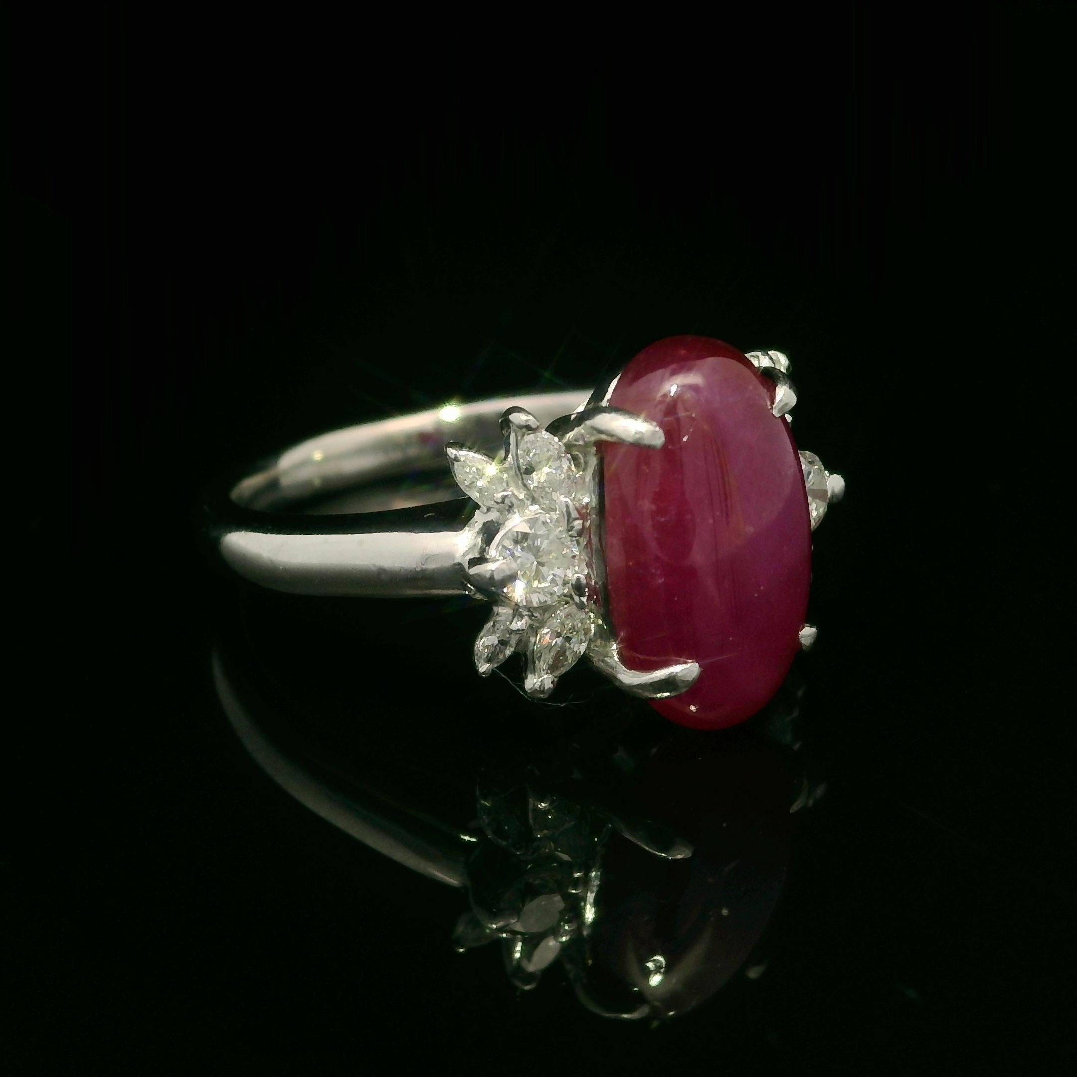 --Stone(s):--
(1) Natural Genuine Star Ruby - Oval Double Cabochon Cut - Prong Set - Purplish-Red Color - No Heat - 4.13ct (exact stamped)
** See Certification Details Below for Complete Info **
(10) Natural Genuine Diamonds - 8 Marquise Cut w/ 2