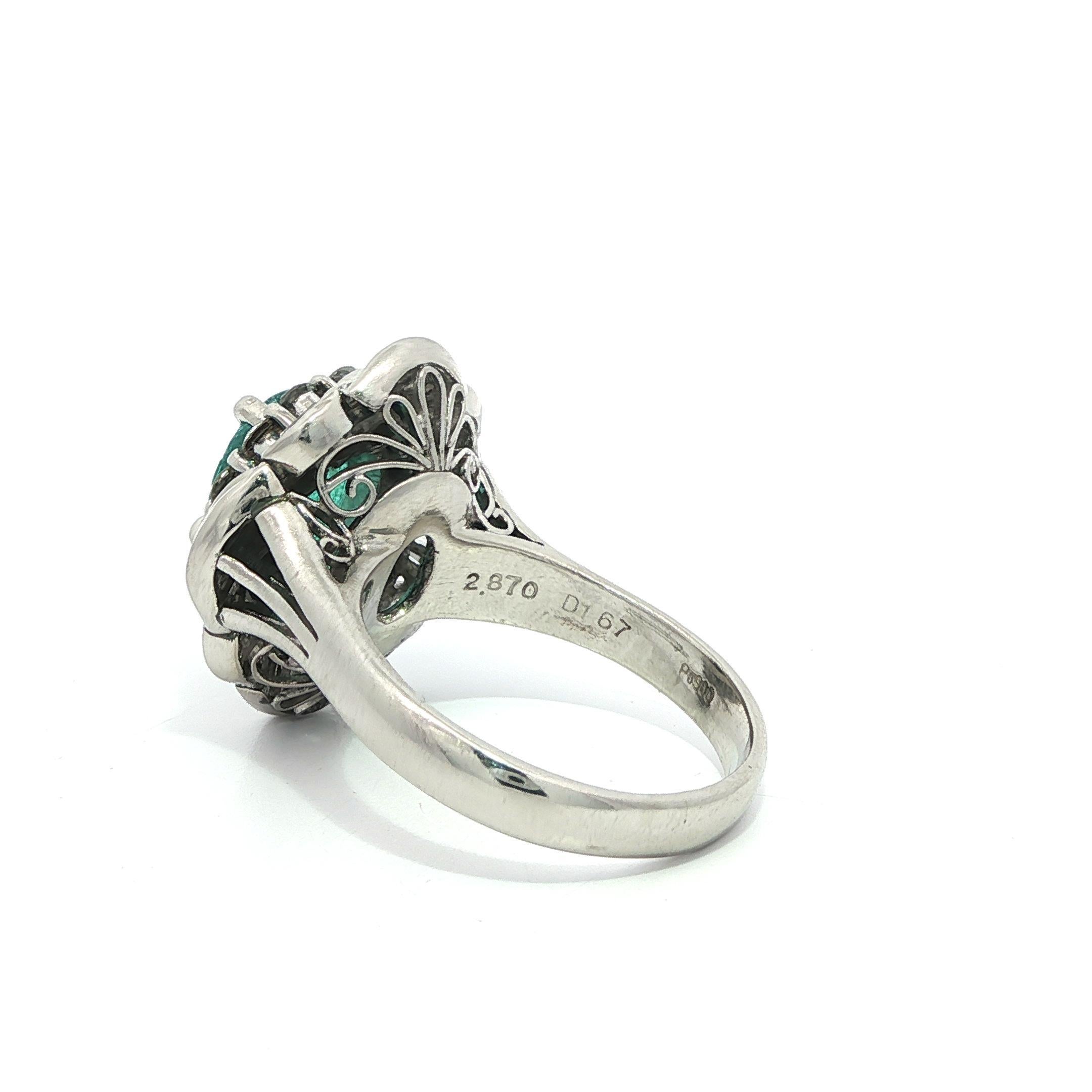 Oval Cut Vintage Platinum GIA 4.54ct Bluish Green Glowing Paraiba Tourmaline Diamond Ring For Sale