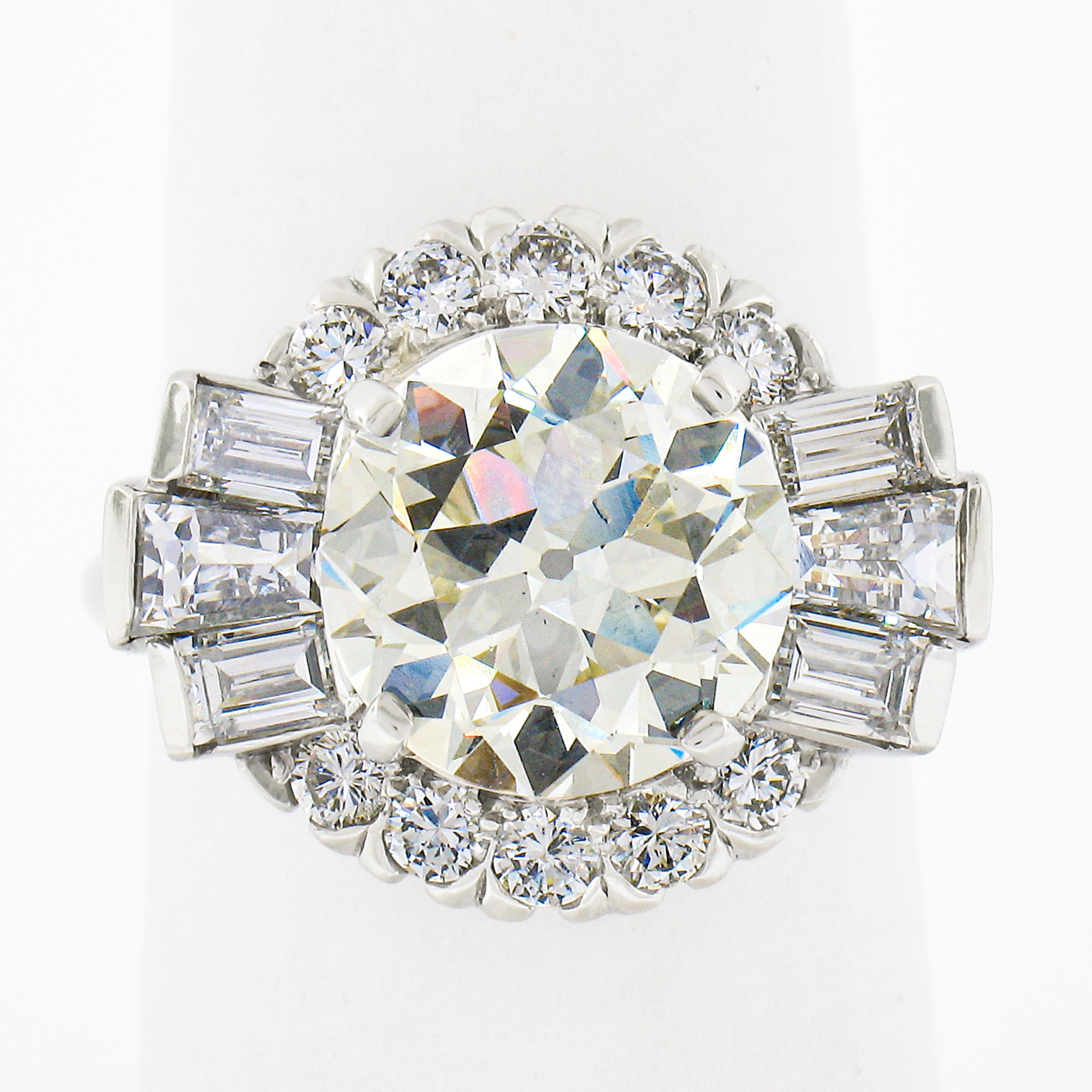 Round Cut Vintage Platinum GIA 5.56ctw Old Cut Round & Baguette Diamond Engagement Ring For Sale