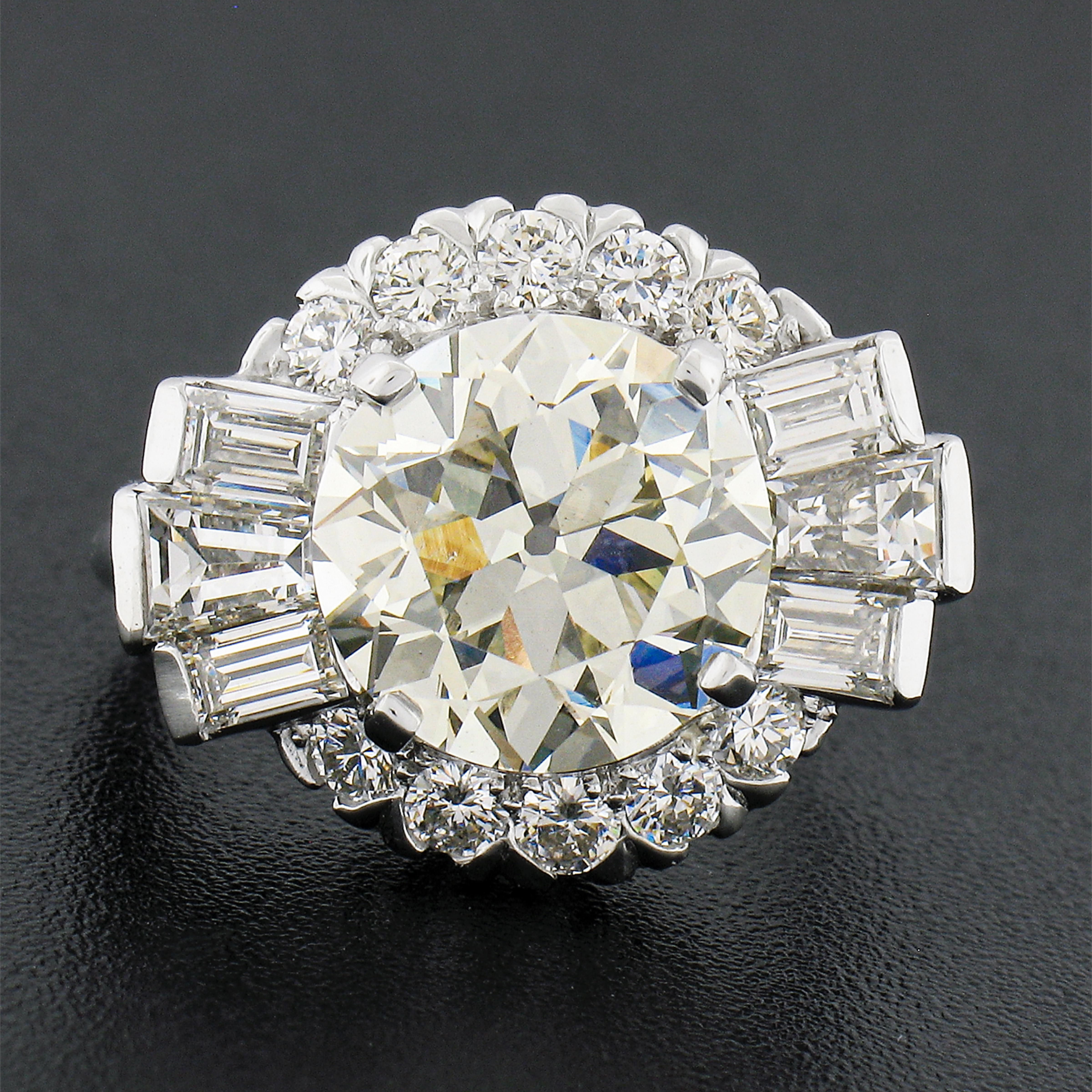 Vintage Platinum GIA 5.56ctw Old Cut Round & Baguette Diamond Engagement Ring In Excellent Condition For Sale In Montclair, NJ