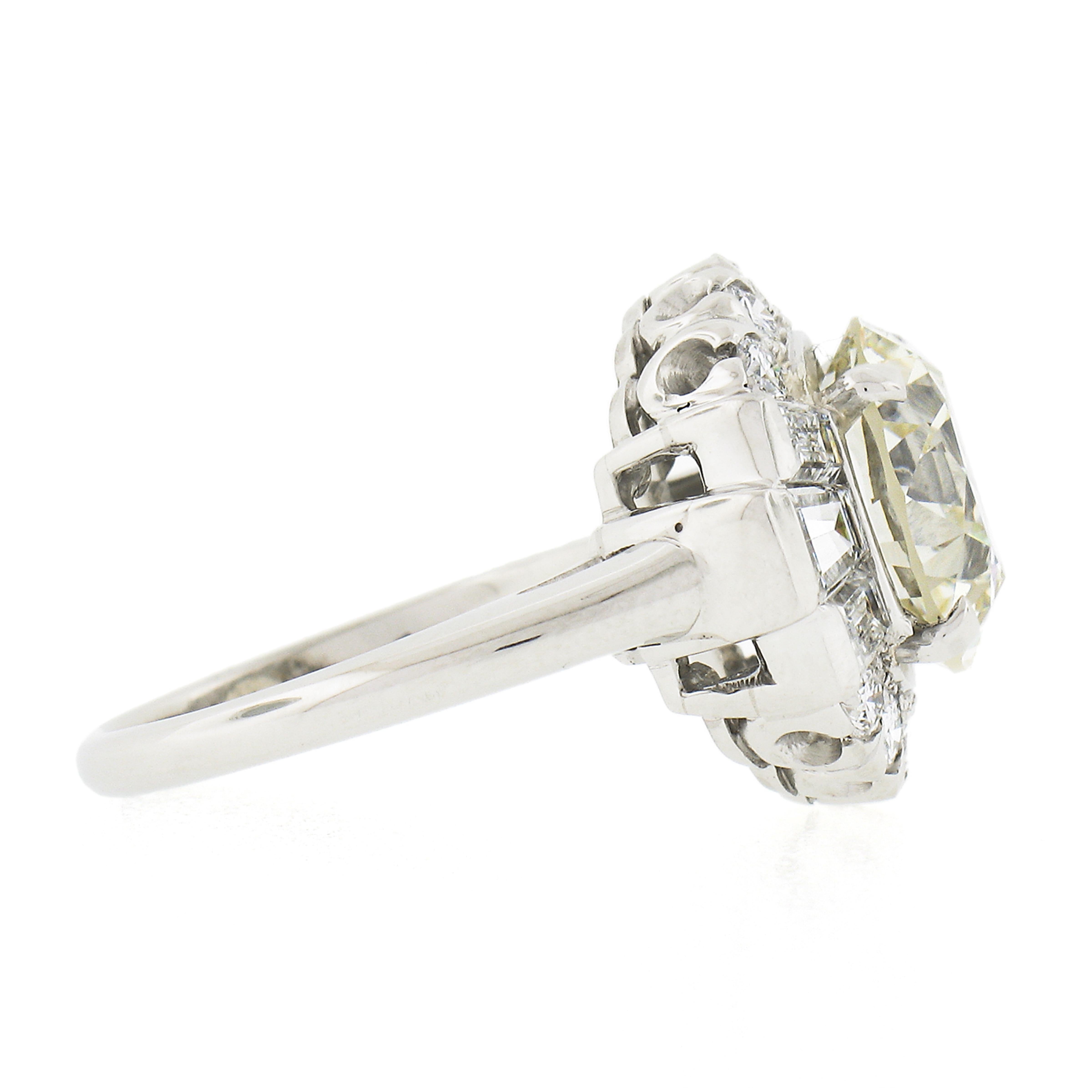 Vintage Platinum GIA 5.56ctw Old Cut Round & Baguette Diamond Engagement Ring For Sale 1
