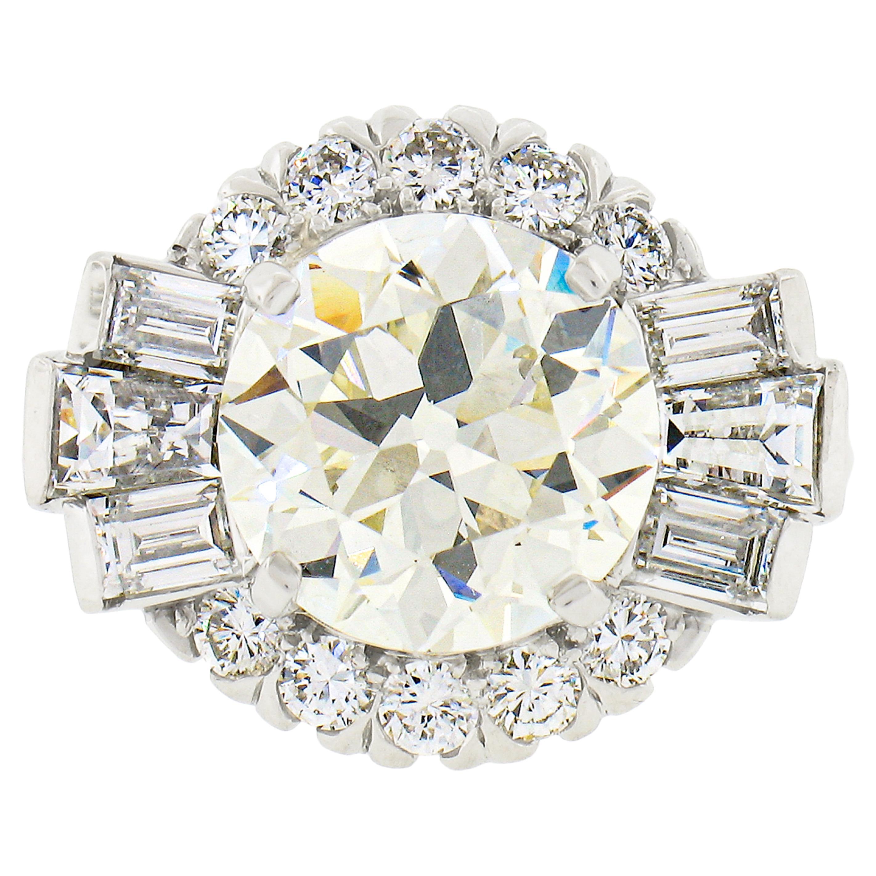 Vintage Platinum GIA 5.56ctw Old Cut Round & Baguette Diamond Engagement Ring For Sale
