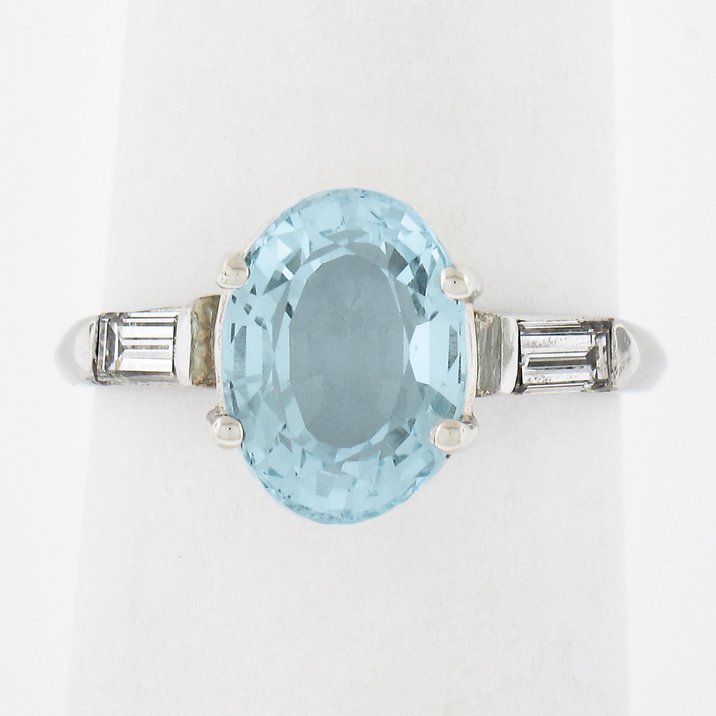 --Stone(s):--
(1) Natural Genuine Aquamarine - Oval Cut - Prong Set - Sky Blue Color - 10.5x7.7mm - 2.65ct (approx.)
(2) Natural Genuine Diamonds - Baguette Cut - Channel Set - F/G Color - VS2/VS2 Clarity - 0.22ctw (approx.)
Total Carat Weight:	2.87
