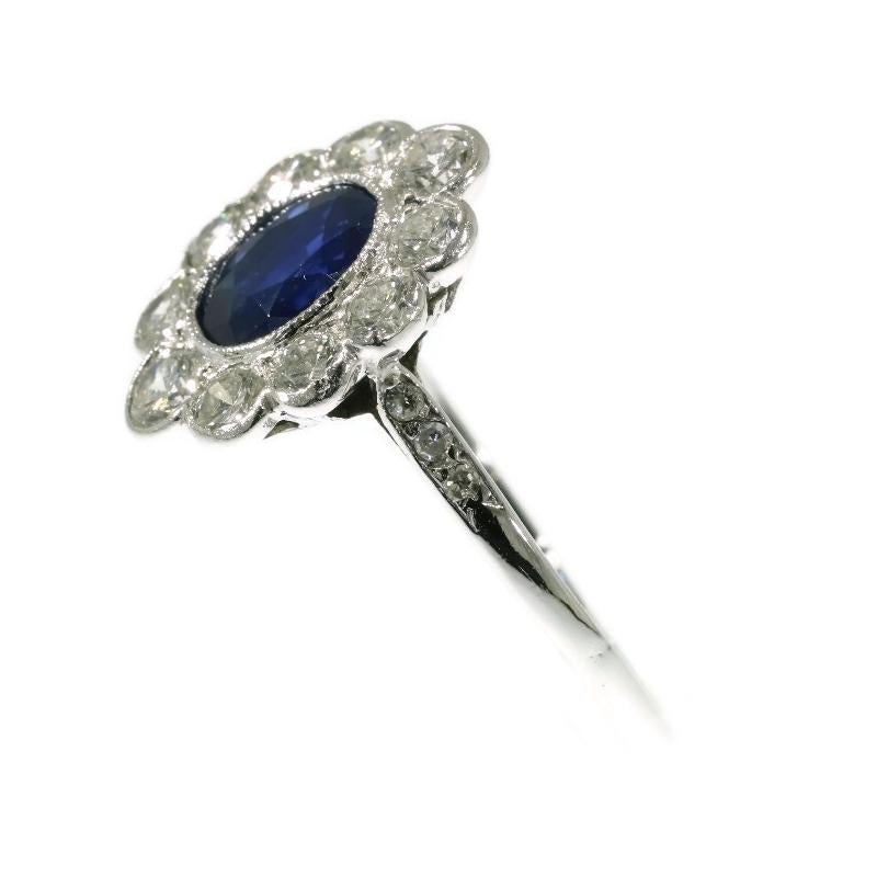 Round Cut Vintage Platinum Lady Di Engagement Ring with Brilliant and Sapphire