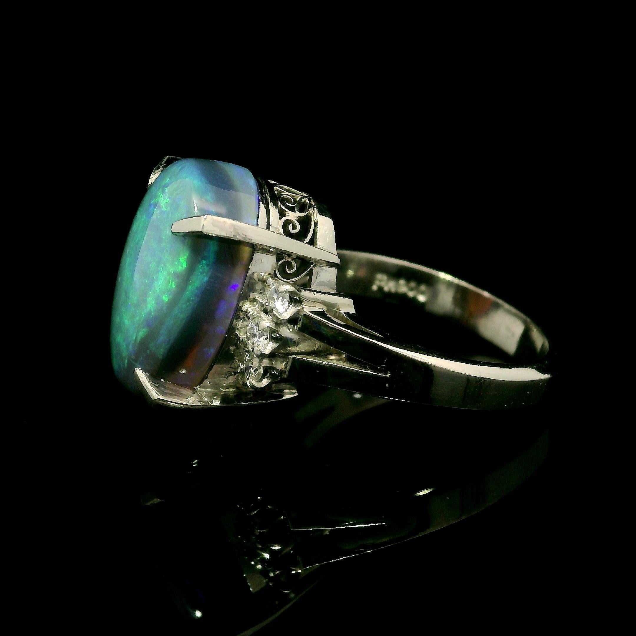 --Stone(s):--
(1) Natural Genuine Opal - Oval Double Cabochon Cut - Prong Set - Gray Color Back w/ Amazing Play of Green & Blue Color - 14.88 x 10.43 x 5.85mm / 6.07ct (exact - stamped)
**See Certification Details Below For More Info**
(2) Natural