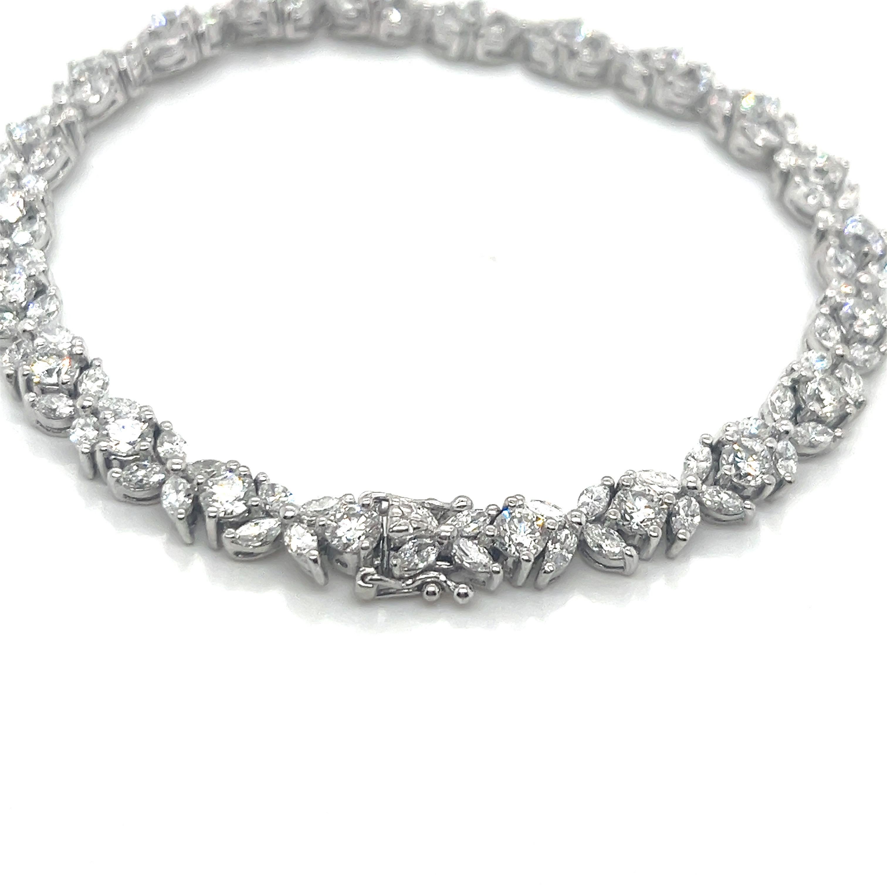 Vintage Platinum Marquise and Round Diamond Tennis Bracelet In Excellent Condition For Sale In Boston, MA