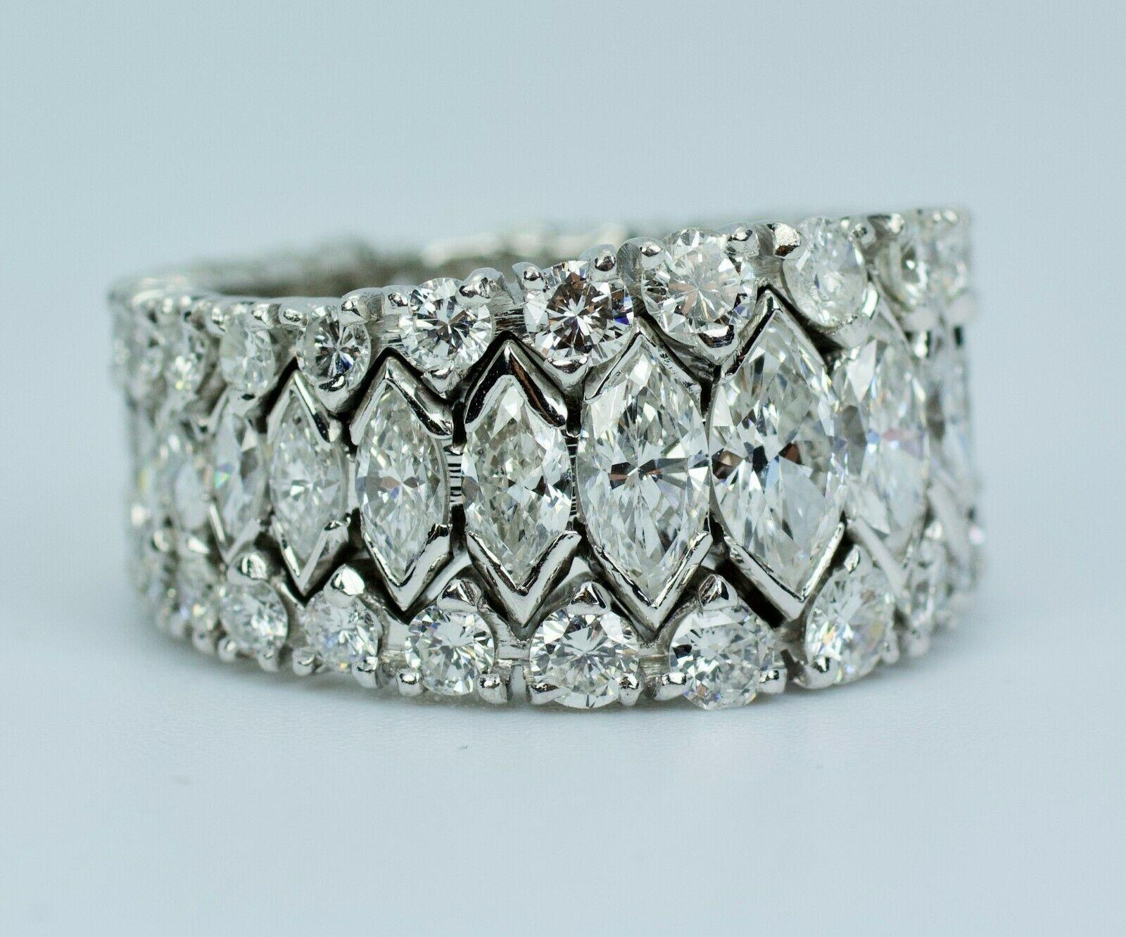 Platinum Round And Marquise Cut Diamonds Eternity Band 
12.1 Grams
Size 7.5
White Marquise Diamonds And Round Diamond 
5 Carats Total Weight 
Color: E-F 
Clarity: Vs
This is an absolutely STUNNING diamond ring. This piece is a real show stopper that