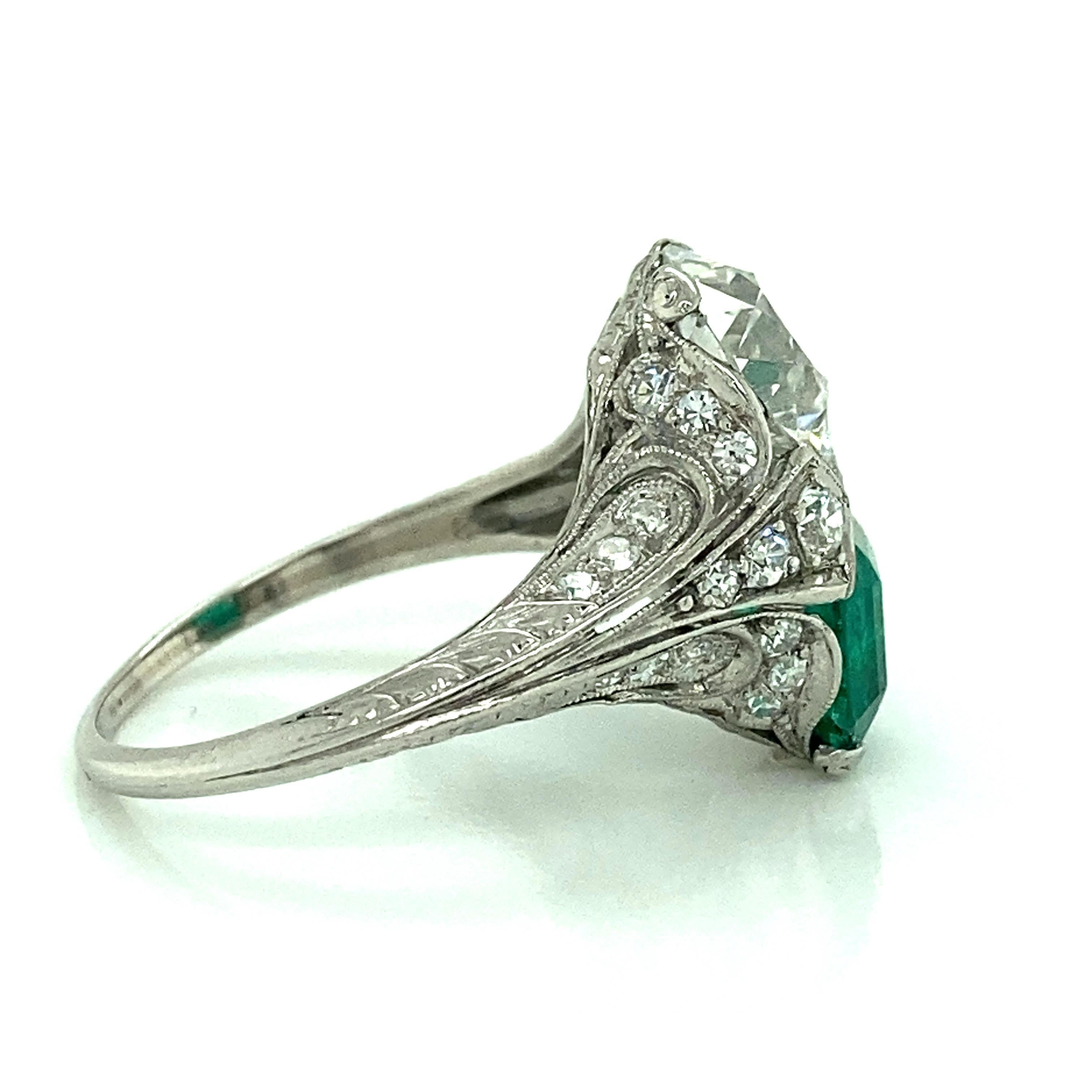 Vintage Platinum Ring
1.96ct Old European Cut Diamond
G, VS2 GIA Cert
1.43ct Columbian Emerald. GIA Cert
Ring size 6 3/4