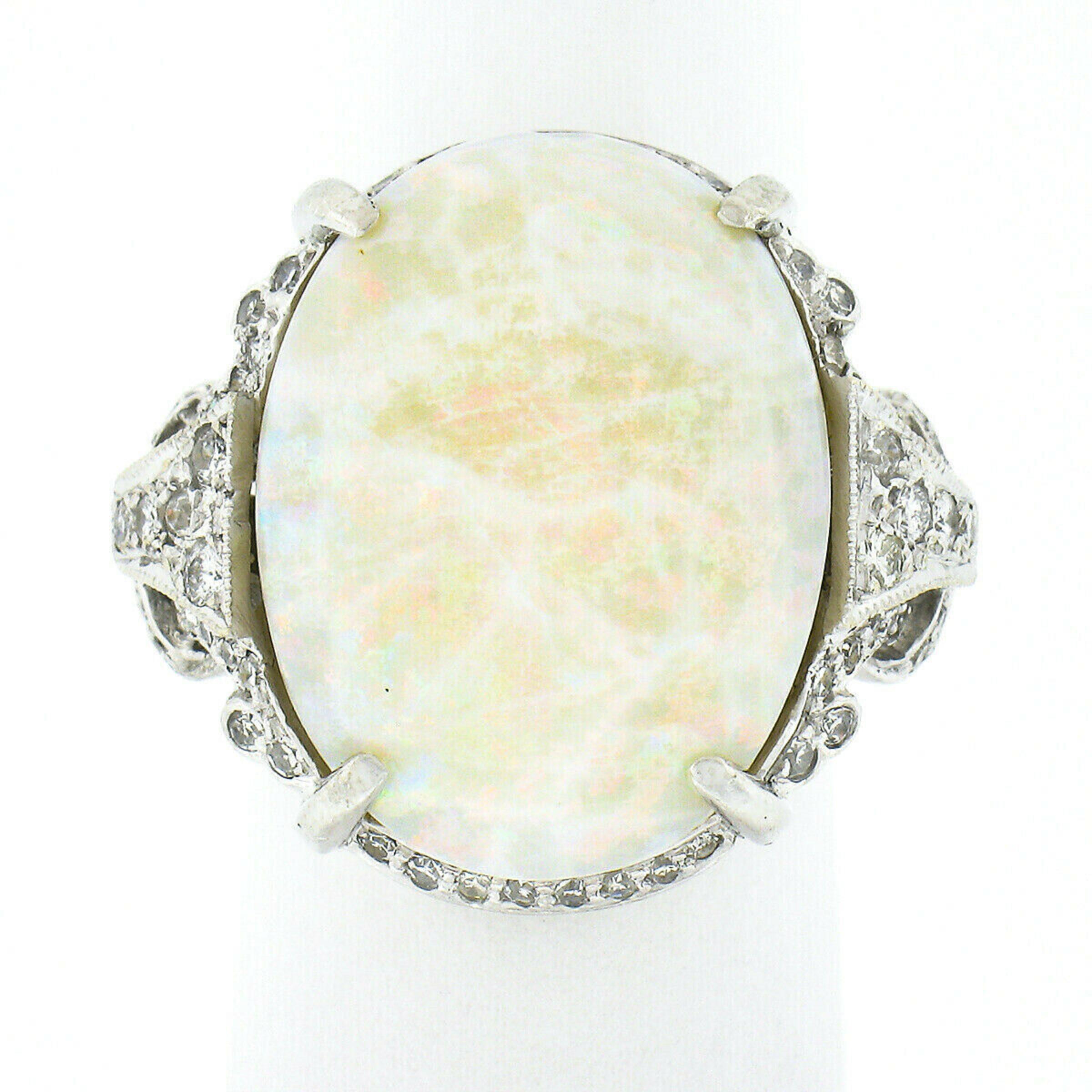 Vintage Platinum Oval Cabochon Opal Solitaire w/ 0.95ctw Diamond Cocktail Ring In Good Condition In Montclair, NJ