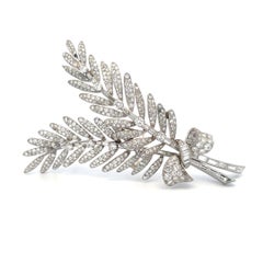Vintage Platinum Pin Brooch with 12.05 Carat Round and Tapered Baguette Diamonds