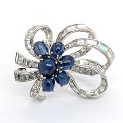 Vintage Platinum Ribbon Shaped Diamond & Blue Sapphire Brooch