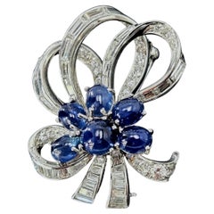 Vintage Platinum Ribbon Shaped Diamond & Blue Sapphire Brooch