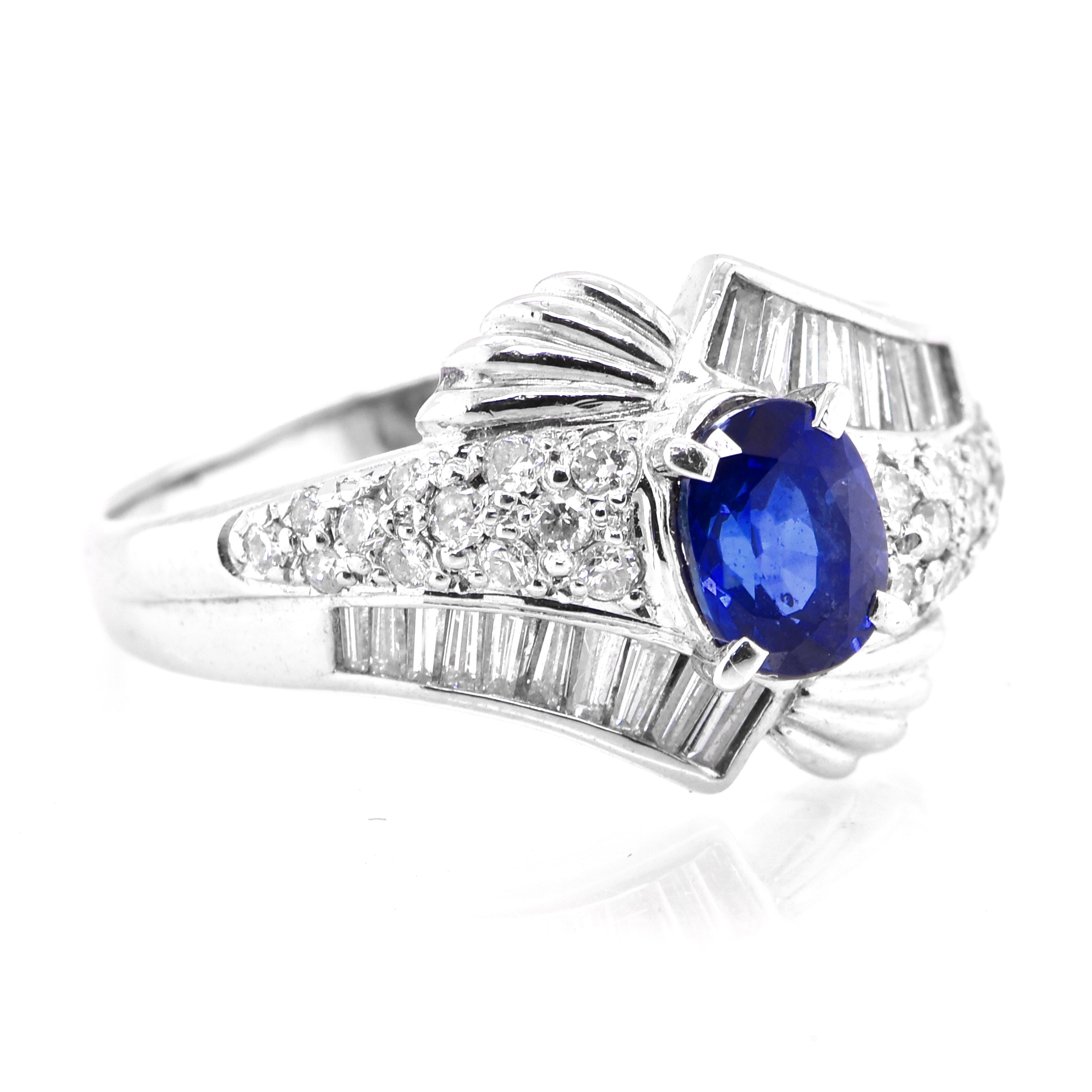 Art Deco Vintage Platinum Ring featuring a 1.05 Carat Blue Sapphire and Diamonds For Sale