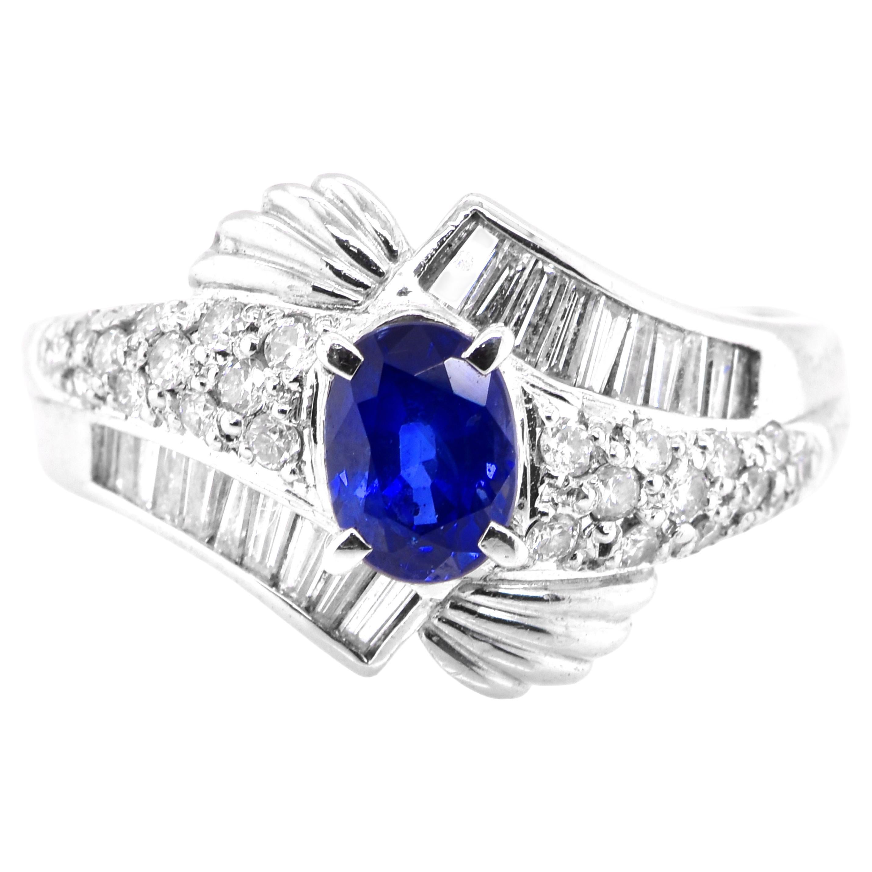 Vintage Platinum Ring featuring a 1.05 Carat Blue Sapphire and Diamonds For Sale