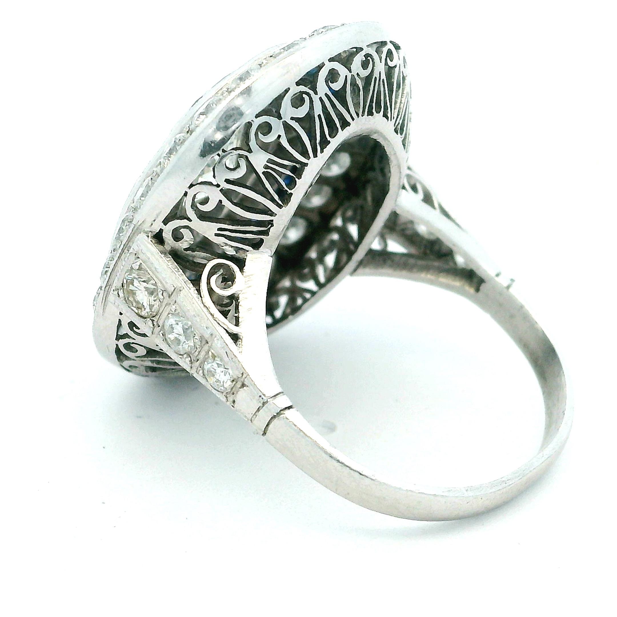 Art Deco  Platinum Ring with Marquise Diamond & Sapphire Halo, circa 1920s For Sale 5