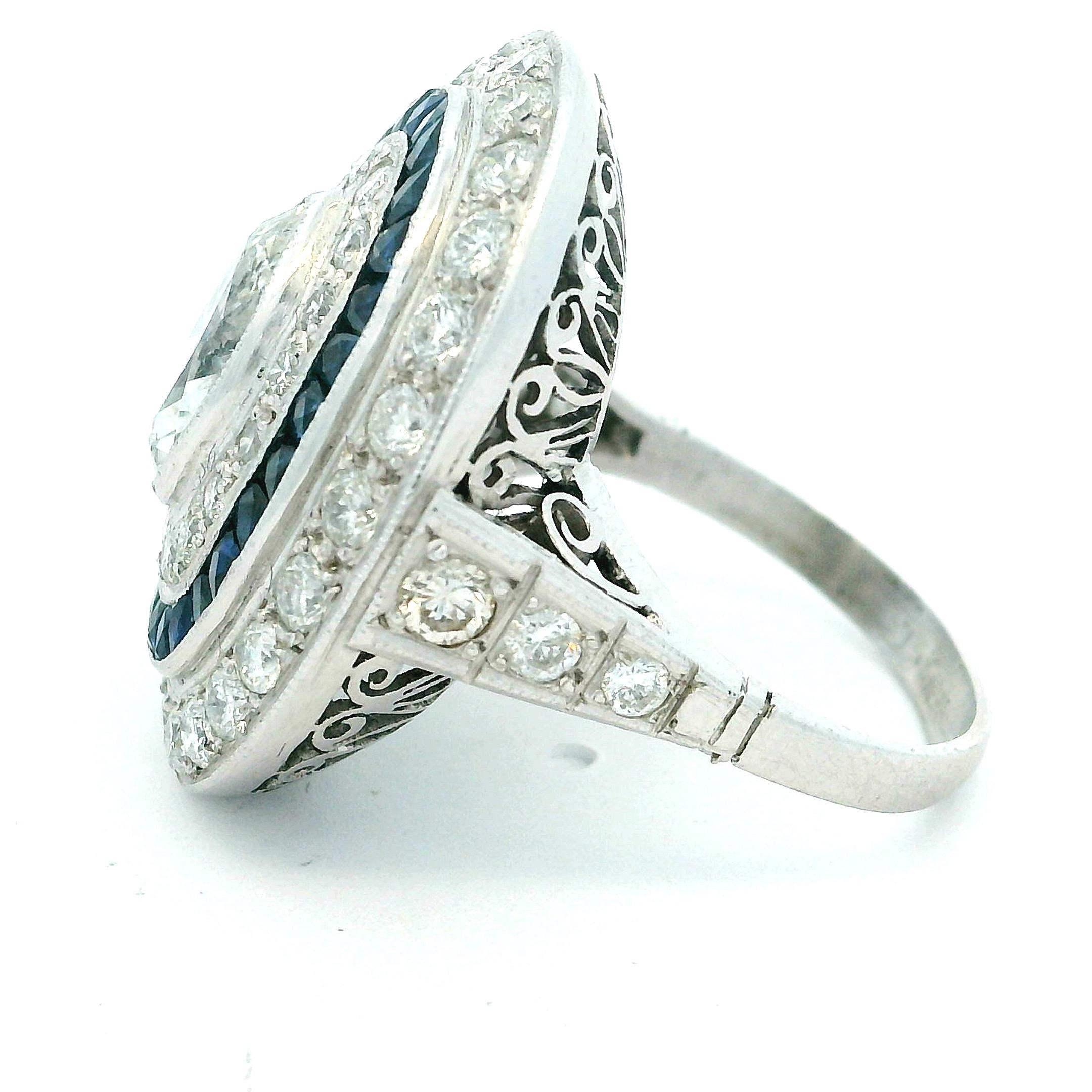 Art Deco  Platinum Ring with Marquise Diamond & Sapphire Halo, circa 1920s For Sale 7