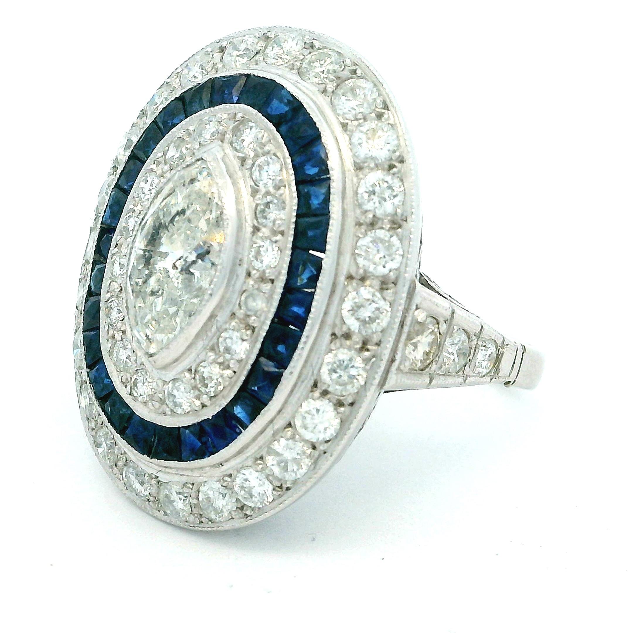 Art Deco  Platinum Ring with Marquise Diamond & Sapphire Halo, circa 1920s For Sale 8