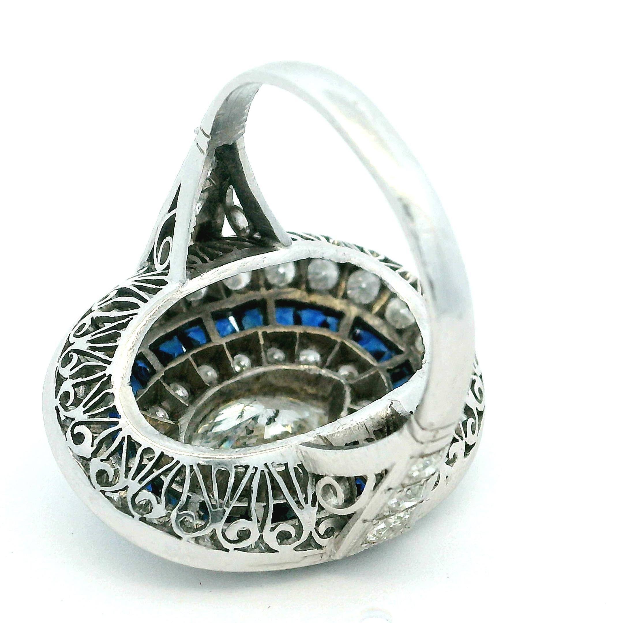 Art Deco  Platinum Ring with Marquise Diamond & Sapphire Halo, circa 1920s For Sale 9