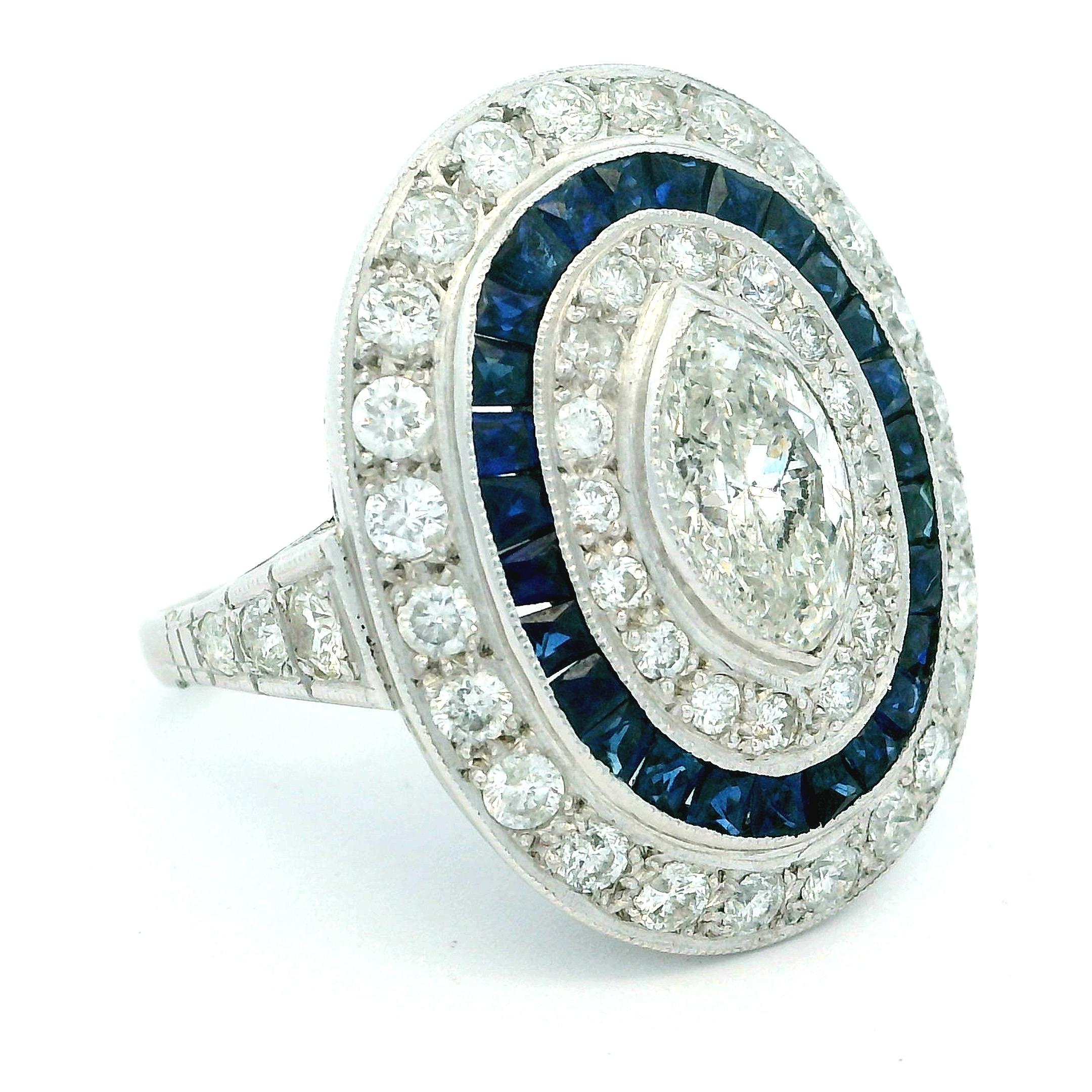 Women's or Men's Art Deco  Platinum Ring with Marquise Diamond & Sapphire Halo, circa 1920s For Sale