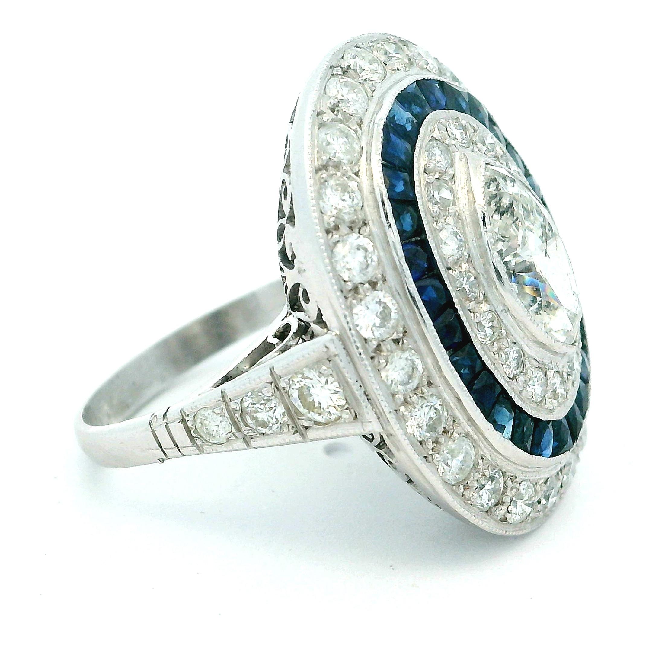 Art Deco  Platinum Ring with Marquise Diamond & Sapphire Halo, circa 1920s For Sale 1