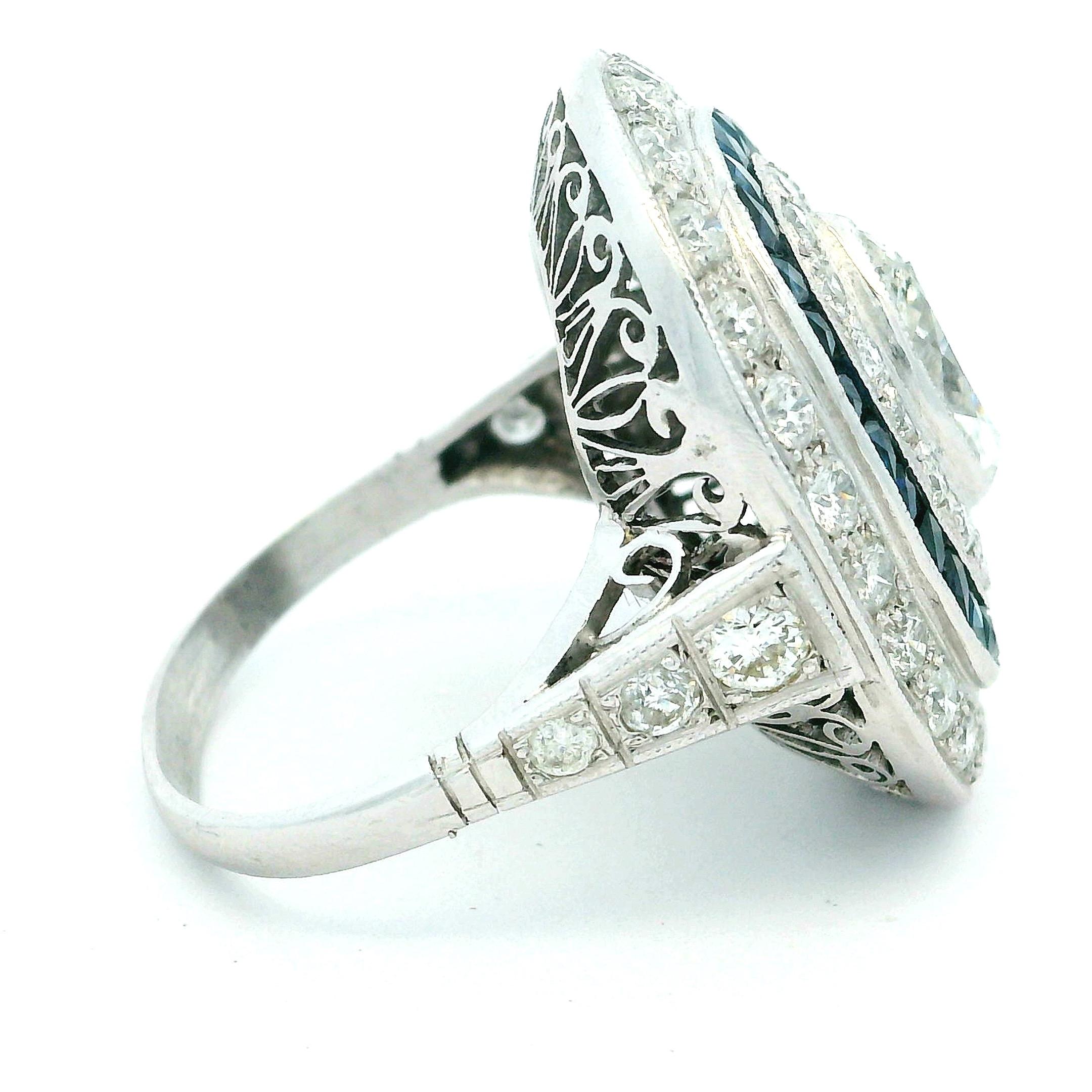 Art Deco  Platinum Ring with Marquise Diamond & Sapphire Halo, circa 1920s For Sale 2