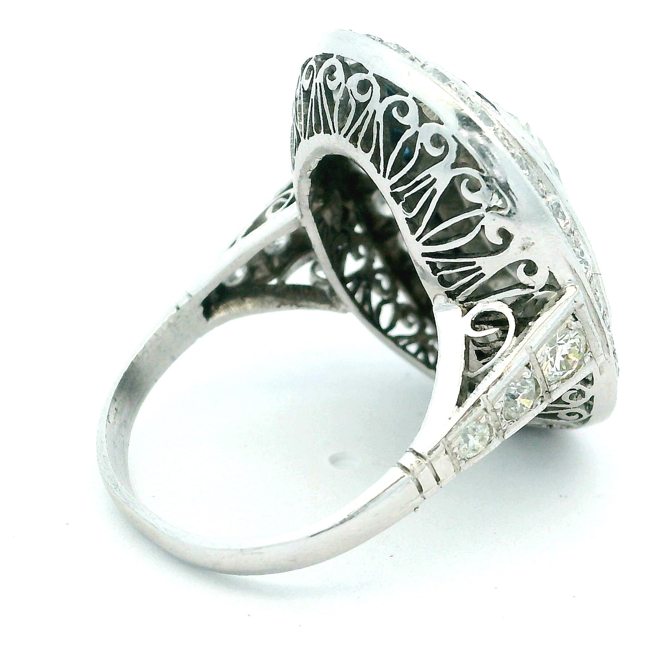 Art Deco  Platinum Ring with Marquise Diamond & Sapphire Halo, circa 1920s For Sale 3