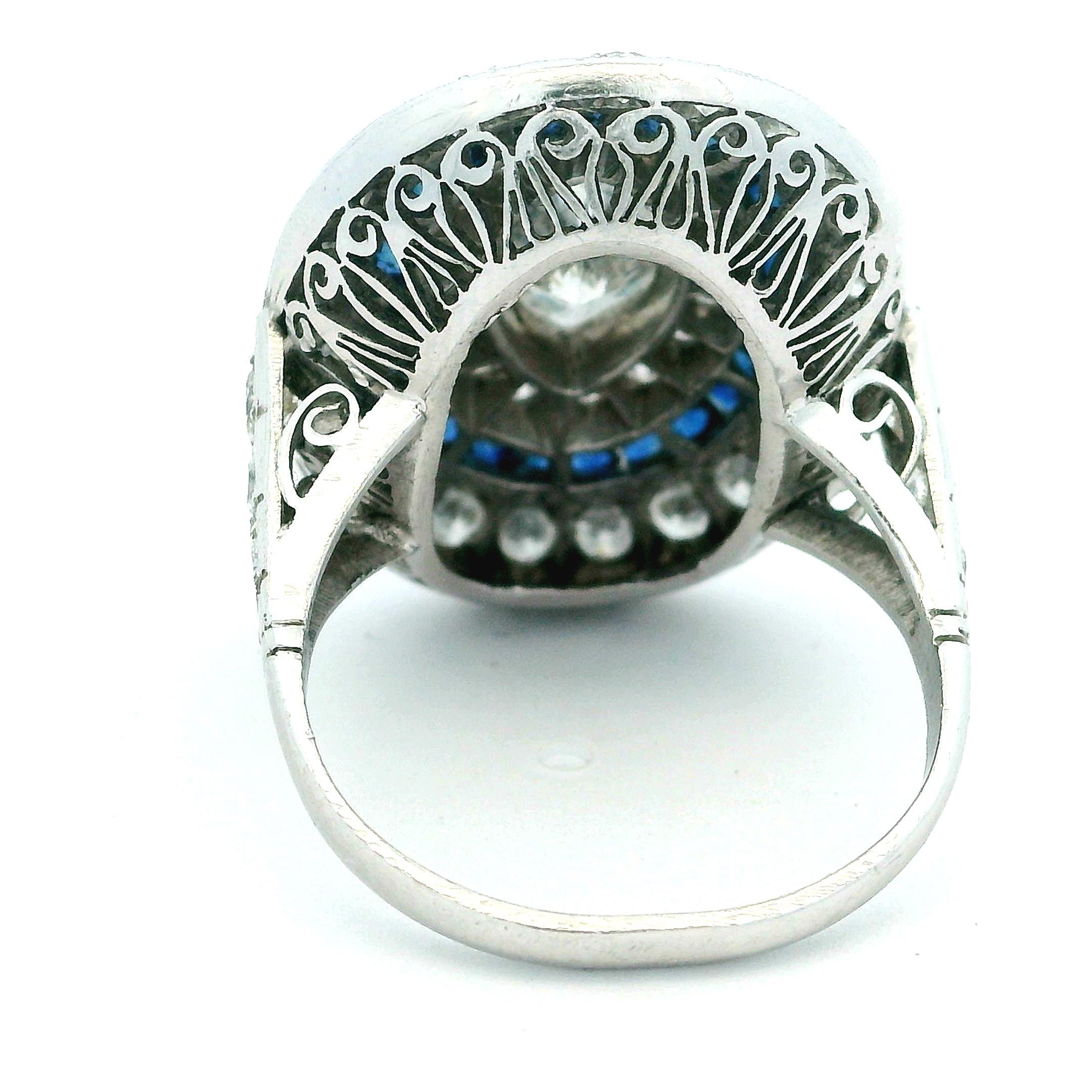 Art Deco  Platinum Ring with Marquise Diamond & Sapphire Halo, circa 1920s For Sale 4