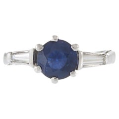 Anillo vintage de platino con zafiro y diamantes