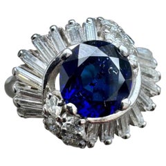 Vintage Platinum Sapphire and Diamond Ring with Baguette Halo