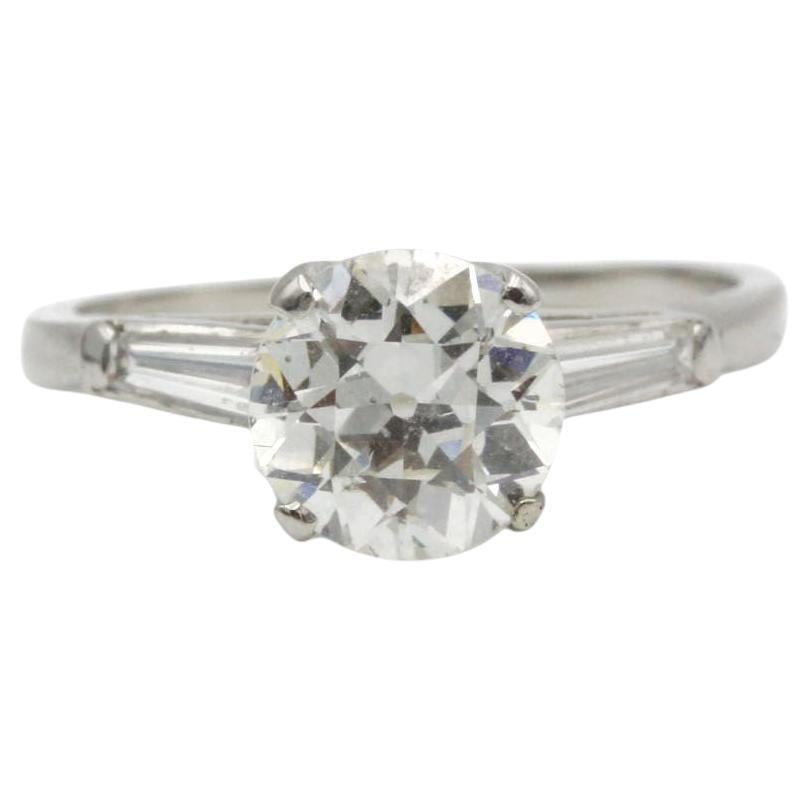 Platinum Solitaire Ring with 1.56 Carat Old-european Cut and Baguettes diamonds