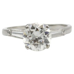 Platinum Solitaire Ring with 1.56 Carat Old-european Cut and Baguettes diamonds