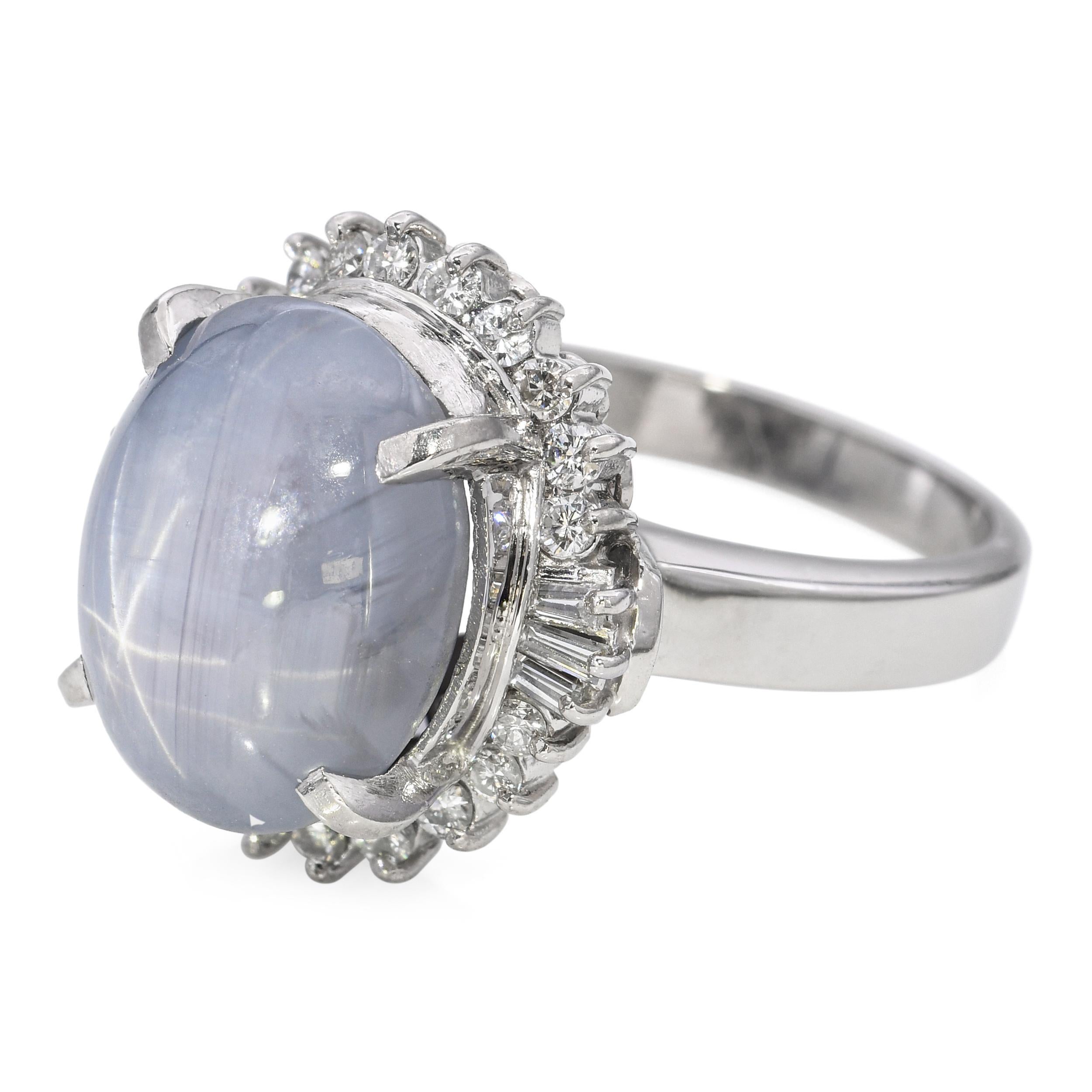 Vintage Platinum Star Sapphire and Diamond Halo Ring In Good Condition For Sale In New York, NY