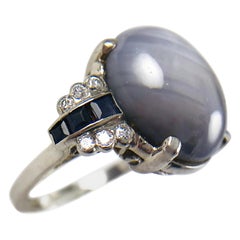 Bague vintage en platine avec saphir étoilé et diamants