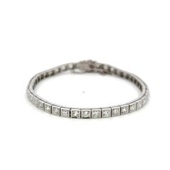 Vintage Platinum Tennis Bracelet with 4.49ct Baguette & Old European Cut Diamond