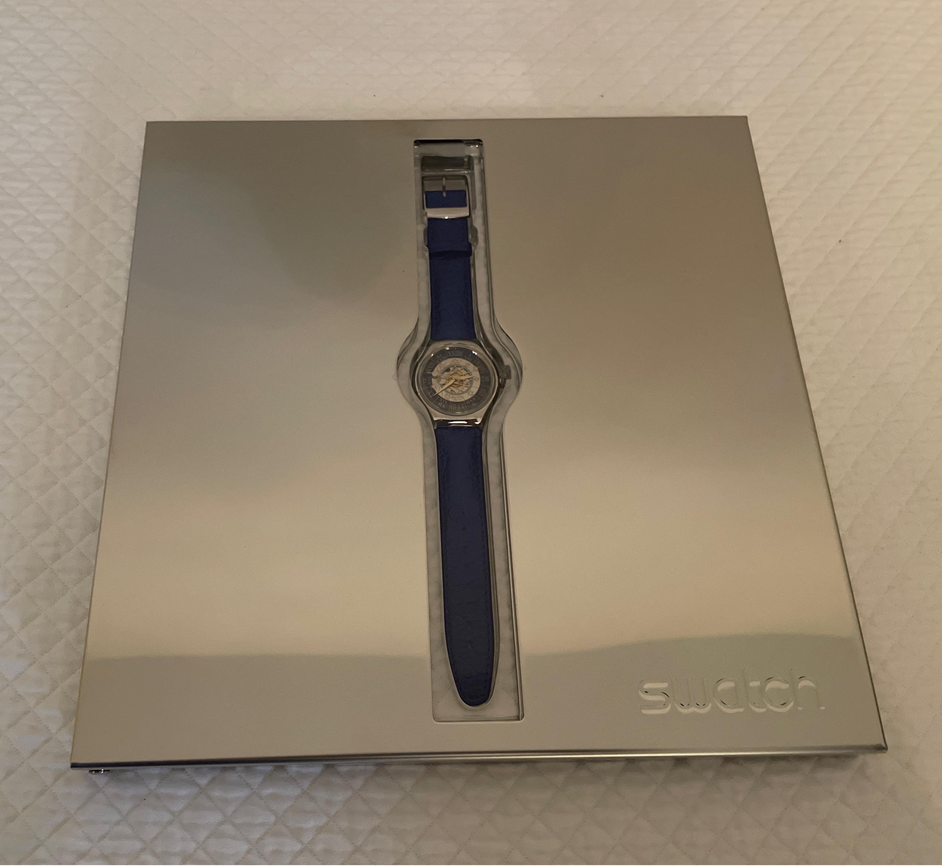 Very rare genuine platinum Swatch Watch made in a limited edition in 1993. This watch was named the Tresor Magique and has an automatic movement. It is in its original packaging and has never been worn. This is a true collector's piece & is truly a