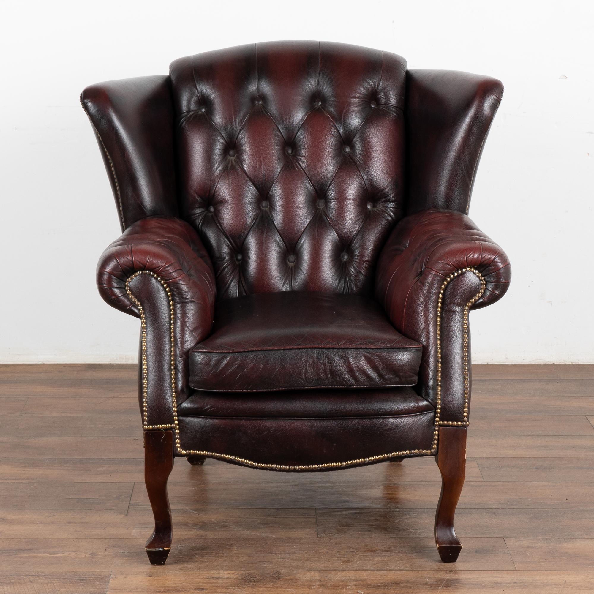 English Vintage Plum Leather Wingback Chesterfield Arm Chair, England circa 1970-80