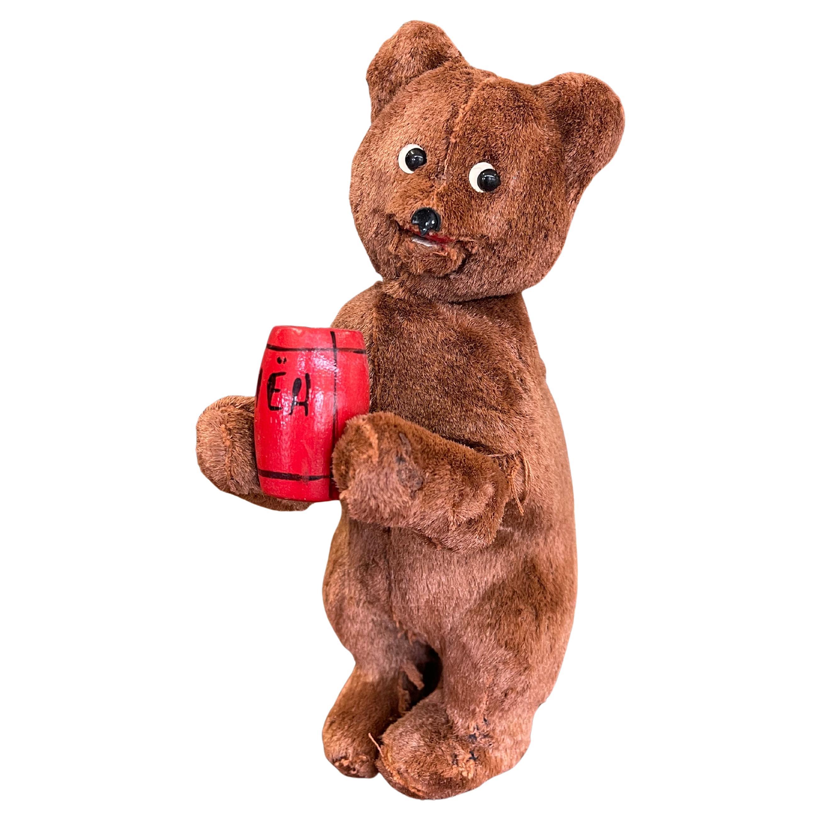 Vintage Plush Mechanical Bear with Red Barrel, Mid-20th Century Toy For Sale
