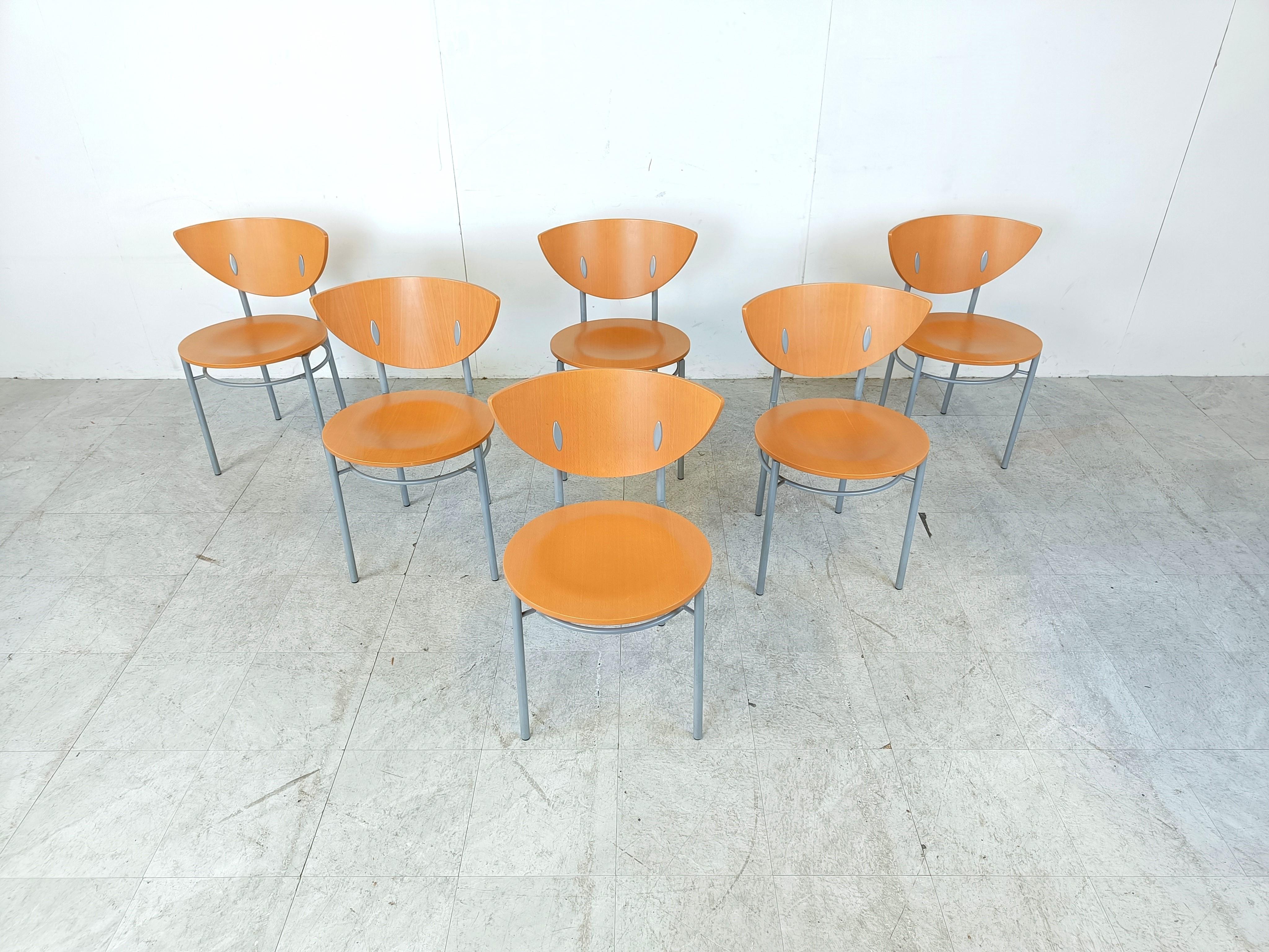 Set of 6 postmodern design dining chairs with grey metal frames and plywood seats.

Timeless and elegant design.

Very sturdy chairs

1990s - Belgium

Dimensions:
Height: 75cm/29.52