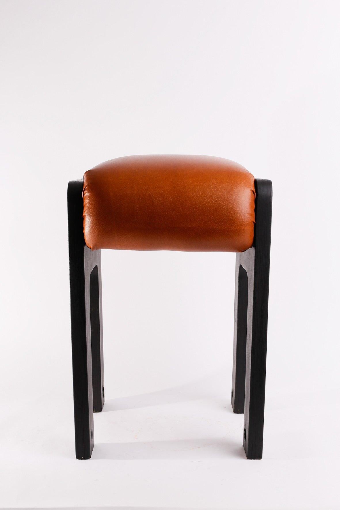 Possibly Italian design stool, with real leather cover, painted black plywood legs. Very good quality and in good shape altogether, circa 1960s-1970s period.
This vintage item has no defects, but it may show slight traces of use.
Light wear