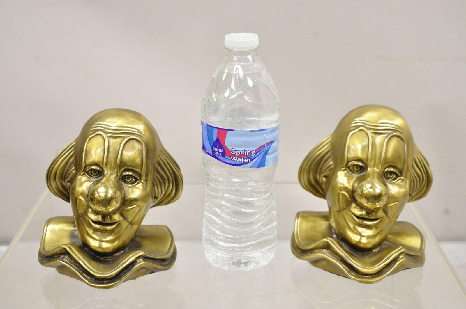 Vintage PM Craftsman Brass Figural Clown Bookends - A Pair. Circa Late 20th Century. Measurements: 5.25