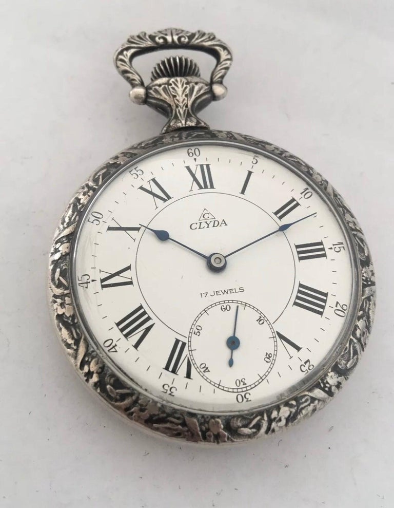 This Silver plated pocket watch is working and ticking well. The case is a bit tarnished as shown. Please study the images carefully as form part of the description.